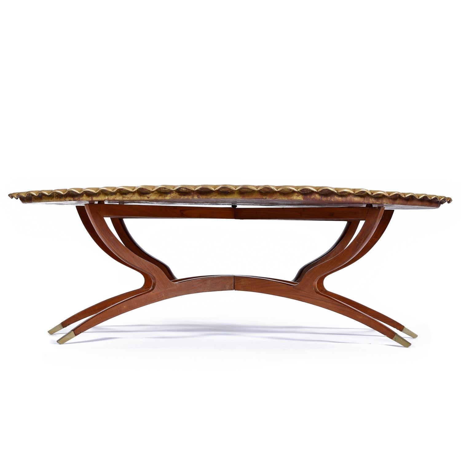 Mix in a touch of exotic mysticism with this Bohemian coffee table from South Asia. This look dovetails nicely with a wide range of styles. A designers dream of versatility, practical function and stunning form. Hand-hammered nuggets of rippled