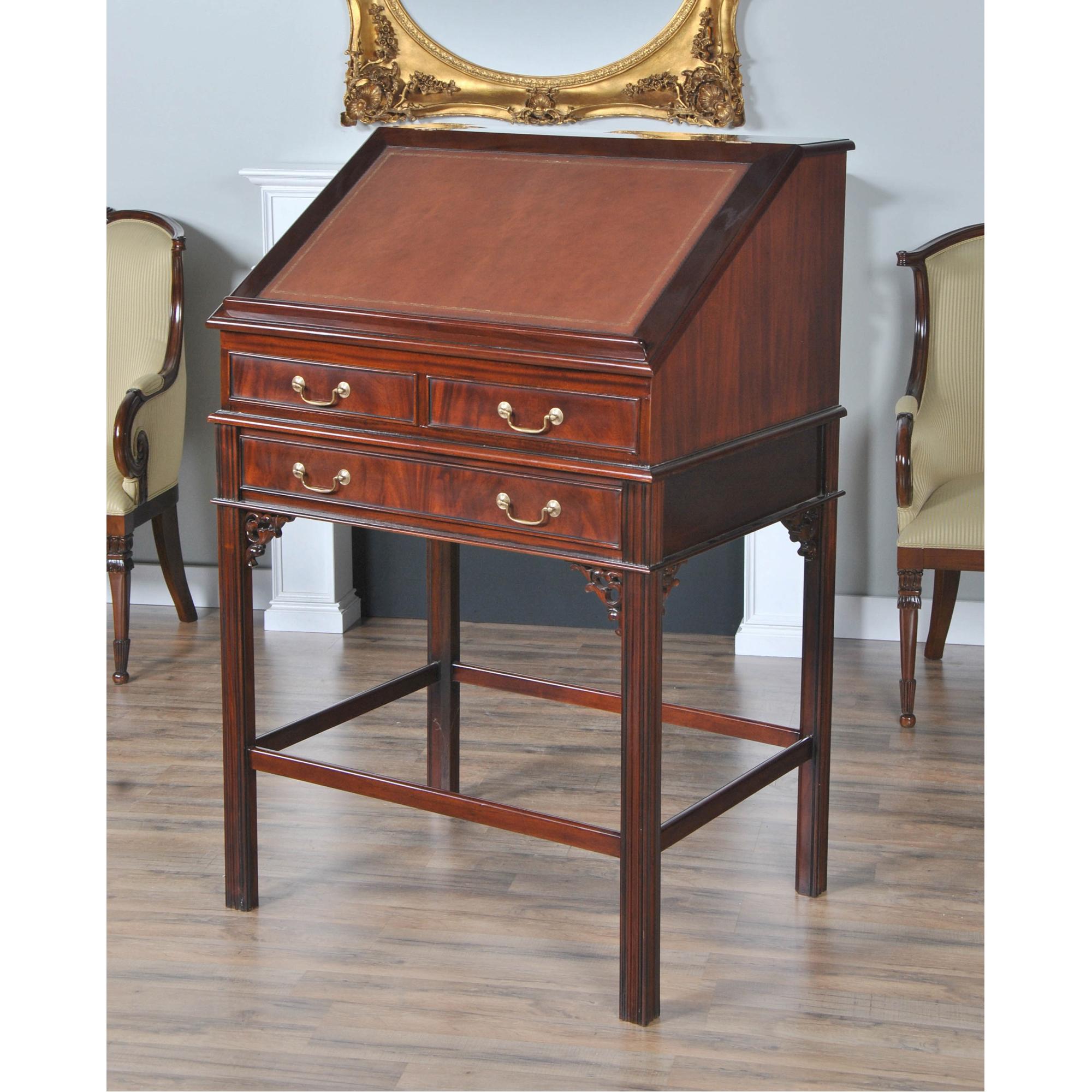 This beautiful Mahogany Stand Up Desk from Niagara Furniture is made of the finest solid mahogany and mahogany veneers. Oversized but with clean lines, this desk has a slant top lid with a genuine full grain leather surface incised with gold