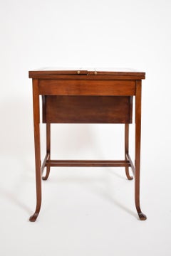 Table de bureau à système en acajou, C.I.C.