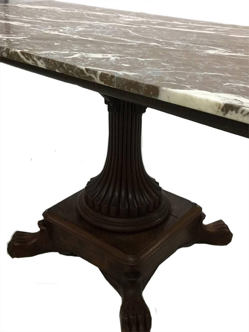 19th Century Coffee Table with Marble Top

The mahogany table leg is from circa 1880
The table with lion feet and on top a brown, grey and white colored marble top
 
Measure: height 59.5 cm
Width 120 cm
Depth 60 cm.

 