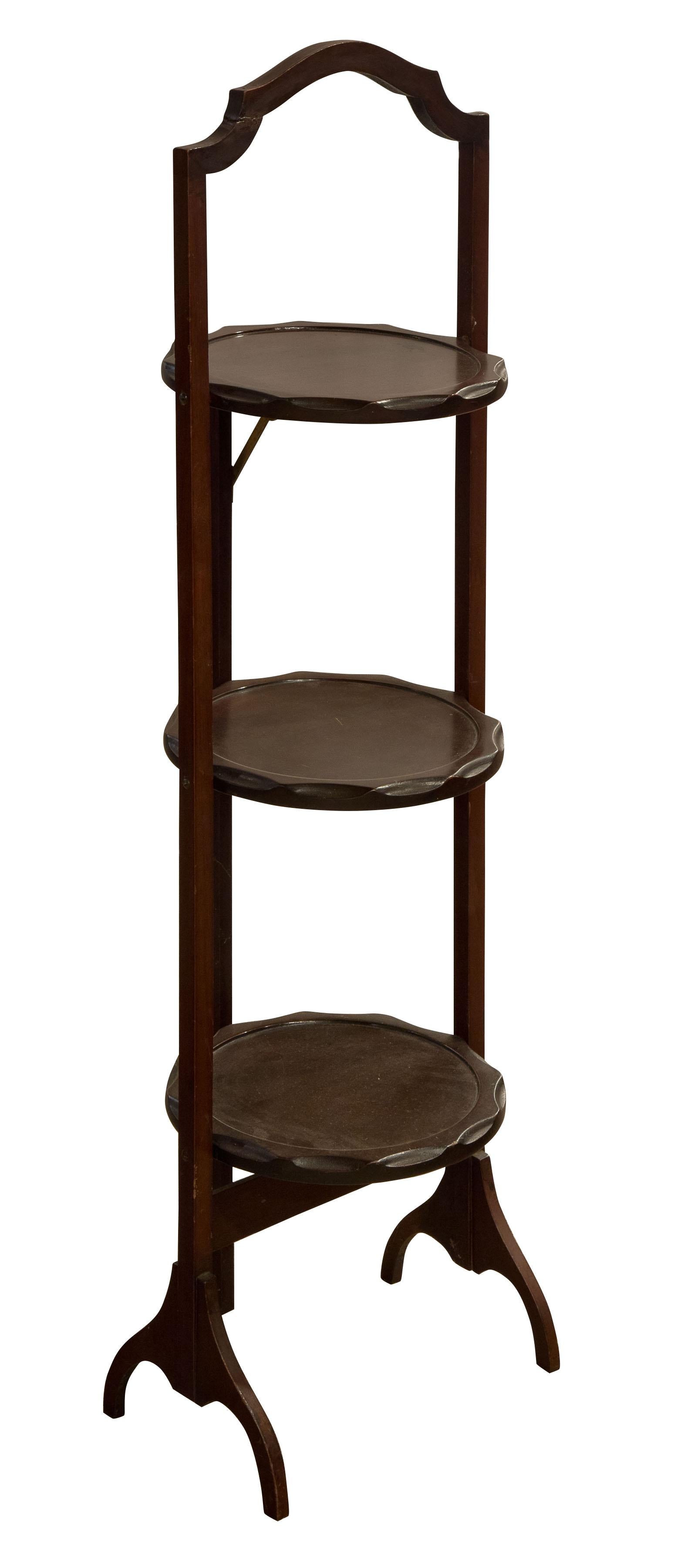 A mahogany three tier folding cake stand.

 

circa 1925.