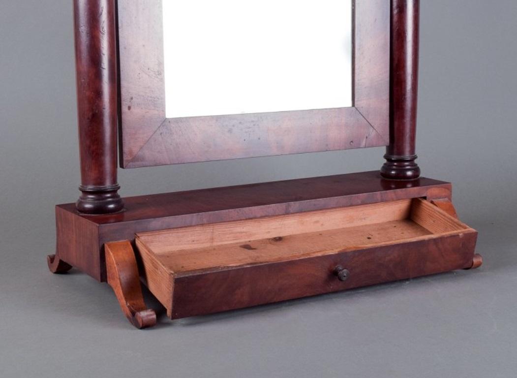 Biedermeier Mahogany tilting mirror with pull-out drawer, Denmark. Approximately 1900. For Sale