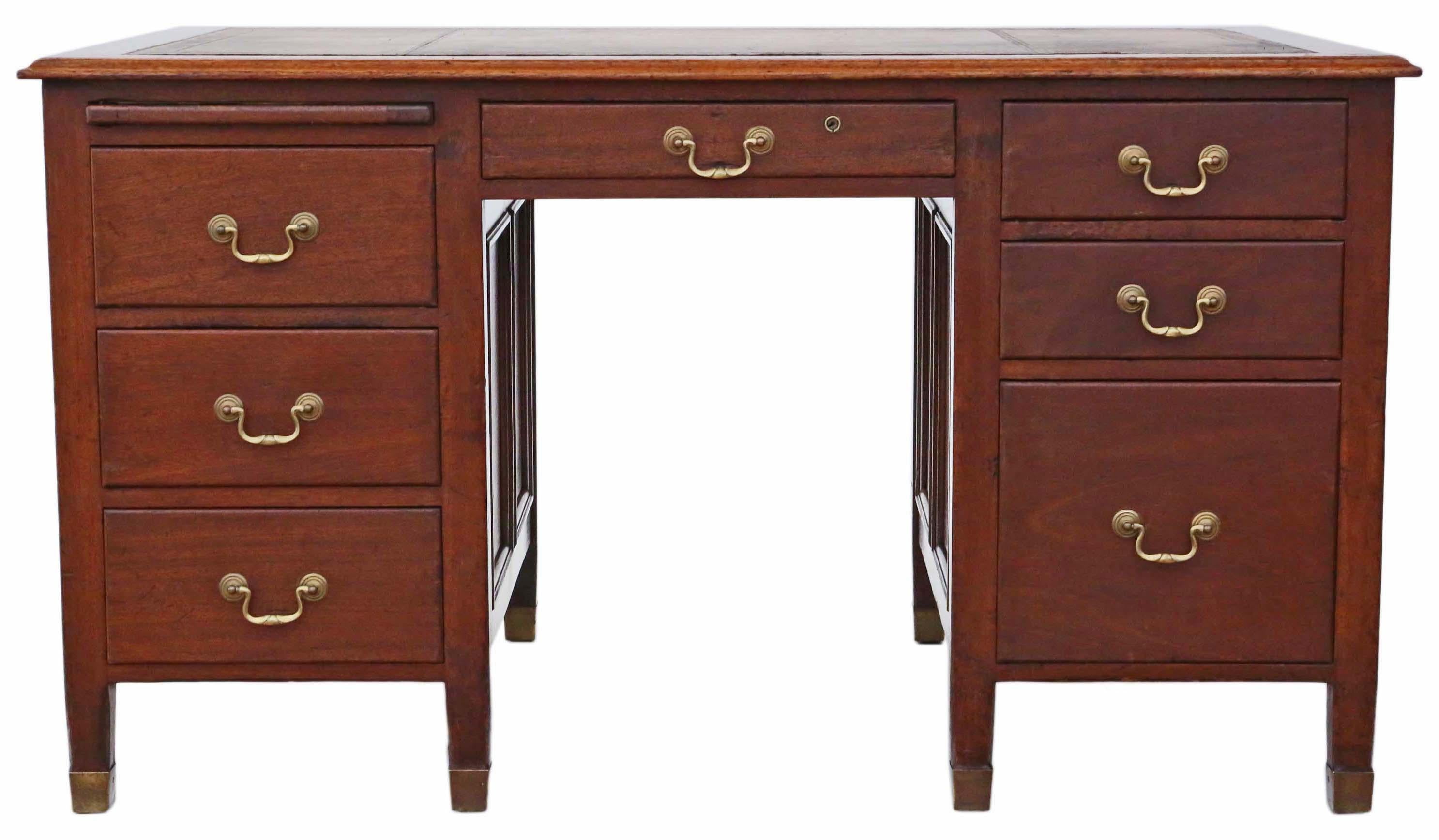 Antique mahogany twin-pedestal partner's desk of exceptional quality.

The desk boasts fantastic proportions, a rich color, and a well-developed patina. Remarkably, there is no evidence of woodworm.

This one-piece desk features a delightful,