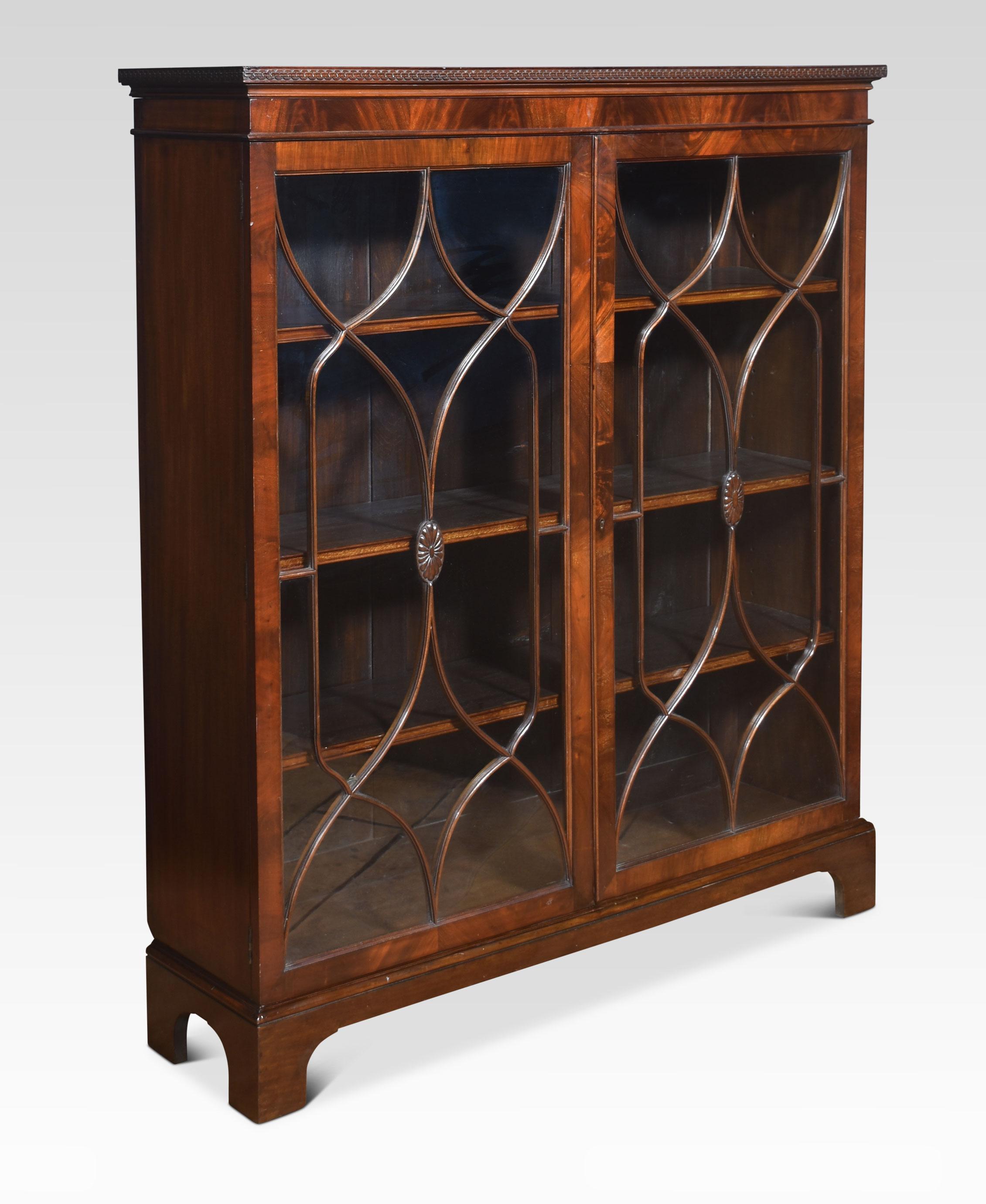 Wood Mahogany two door glazed bookcase For Sale