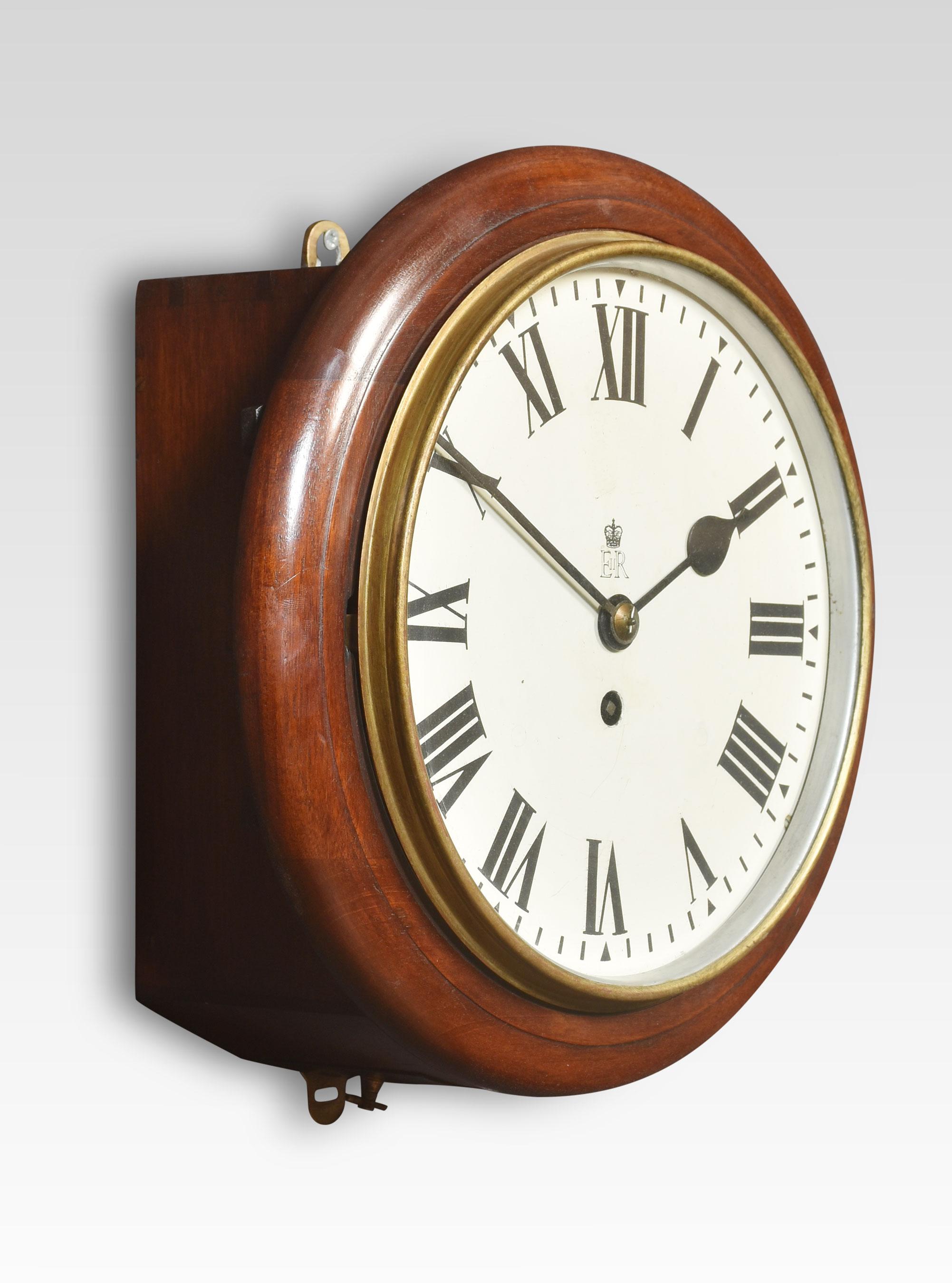 Mahogany Wall Clock, the circular case with glazed brass door to the painted dial with Roman numerals, single fusee movement 
Dimensions
Height 13 Inches
Width 13 Inches
Depth 6.5 Inches