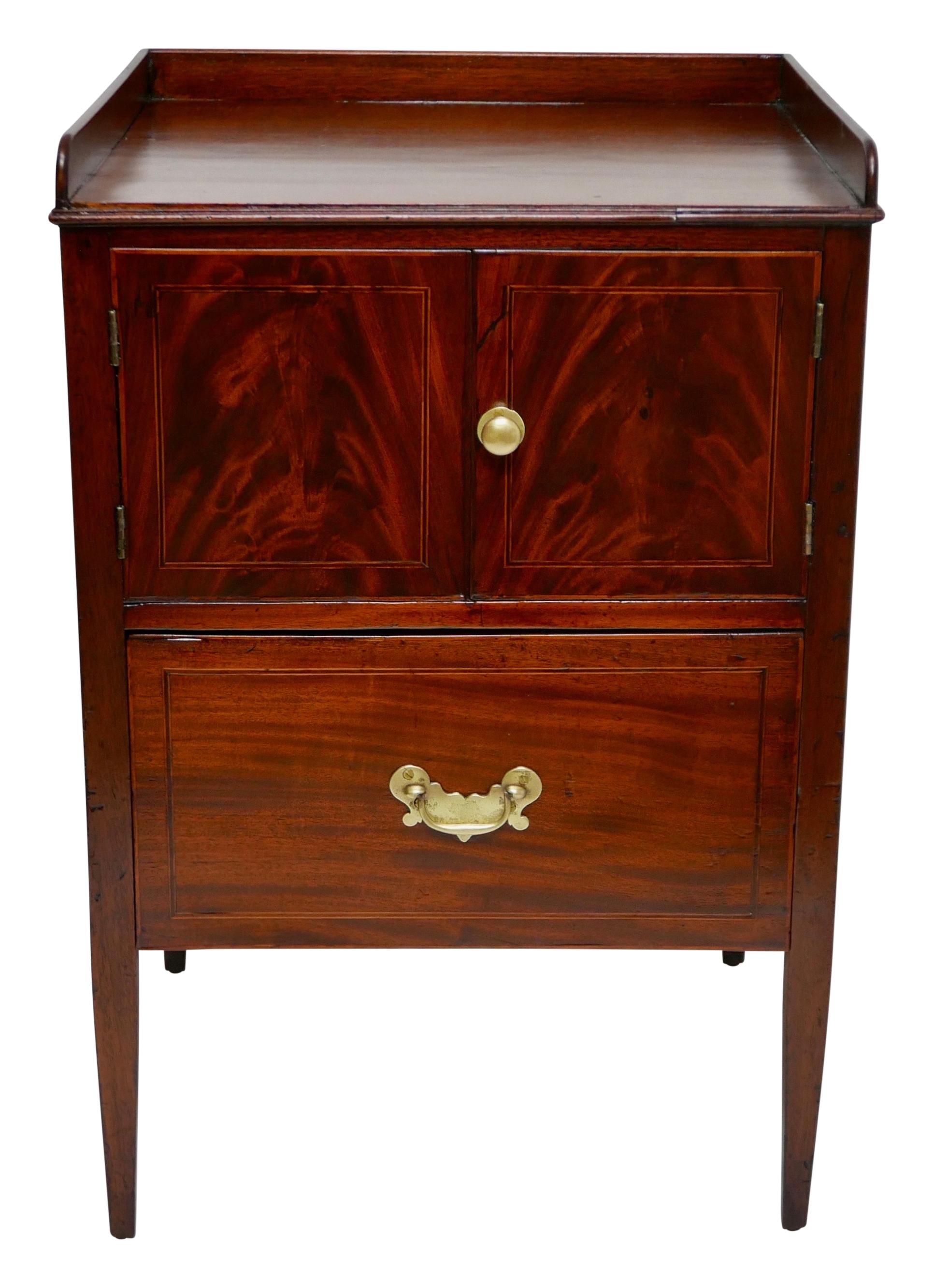 Mahogany washstand or side table with a small cabinet and a single drawer. England, mid-19th century.

   