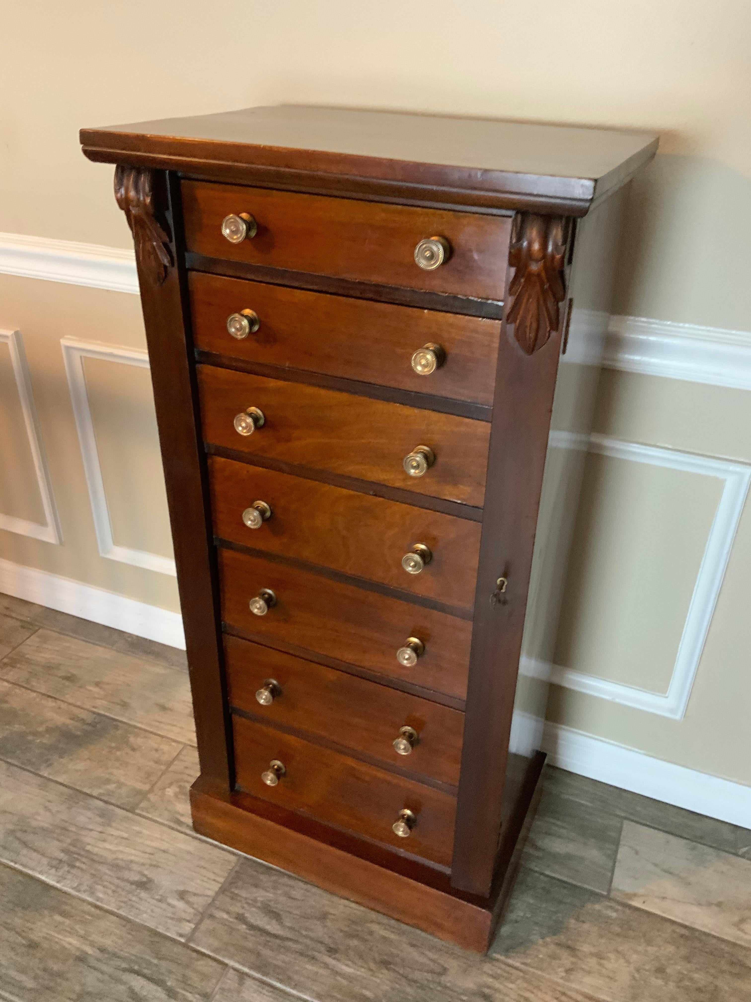 A very nice 19th century seven drawer Mahogany Wellington lock side chest. Dating from about 1870 this chest has a nice mellow aged color to the old Mahogany surface and a great patina. Solid Brass drawer pulls are a later replacement at some point