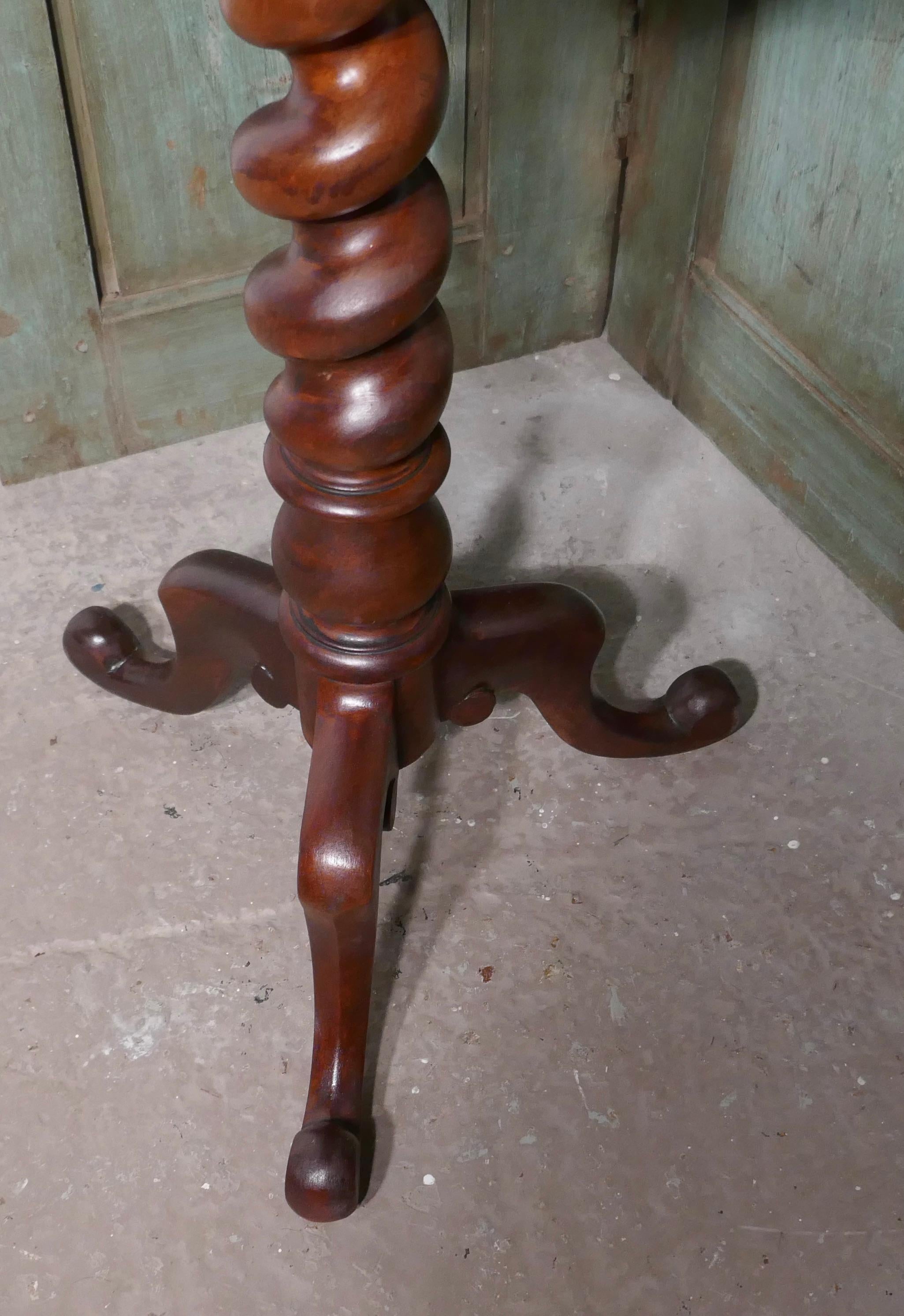 Mahogany wine table or occasional table

This lovely table it stands on a very attractive Barley Twist three footed base 
It has a solid mahogany octagonal top which is beautifully patinated 
The table is in good attractive condition 
The table