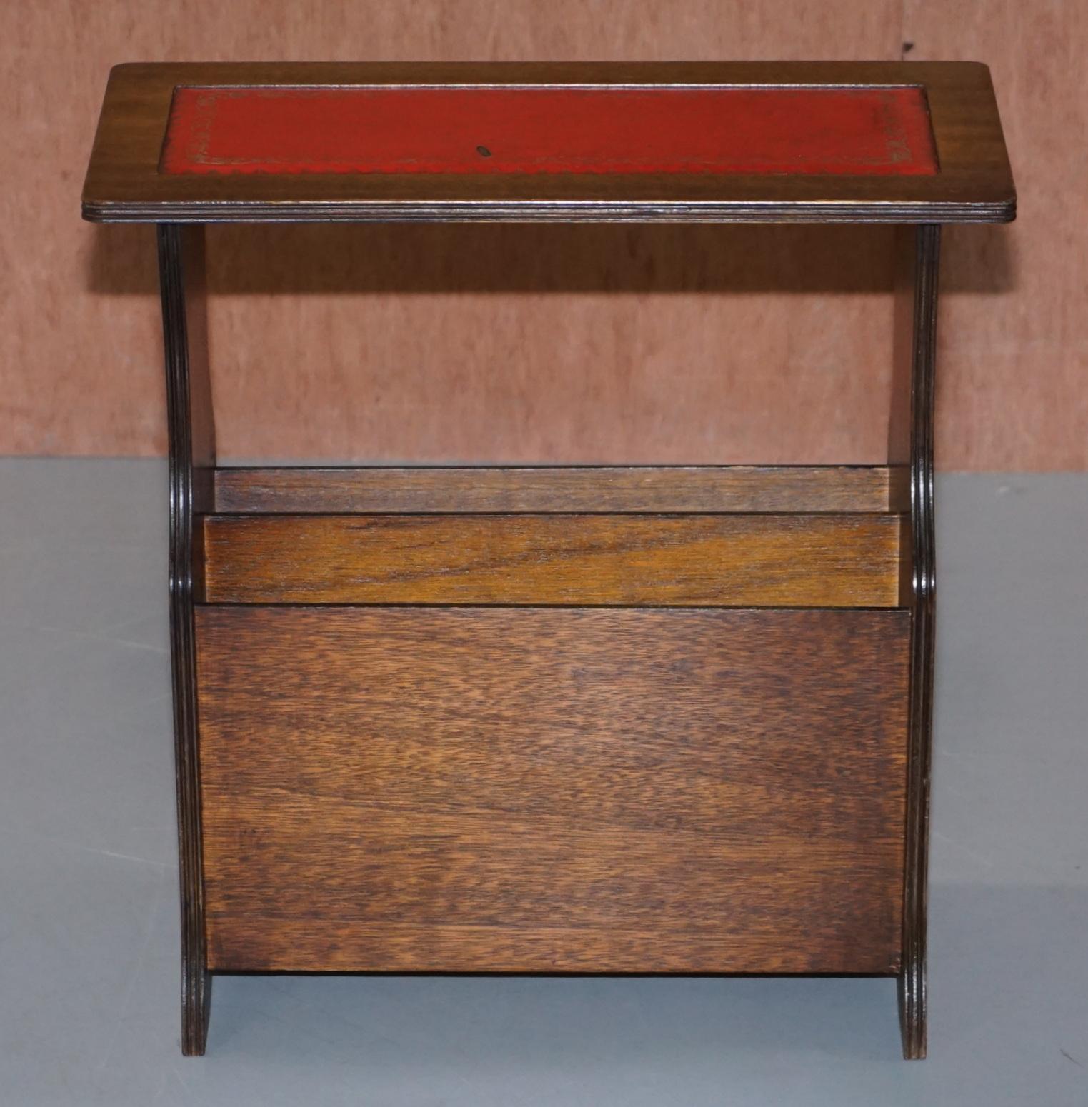 We are delighted to offer for sale this nice vintage light mahogany side table magazine rack with oxblood leather top

A good versatile table, this is circa 40-60 years old, made by Bevan Funnell, the frame is light mahogany, the leather top is