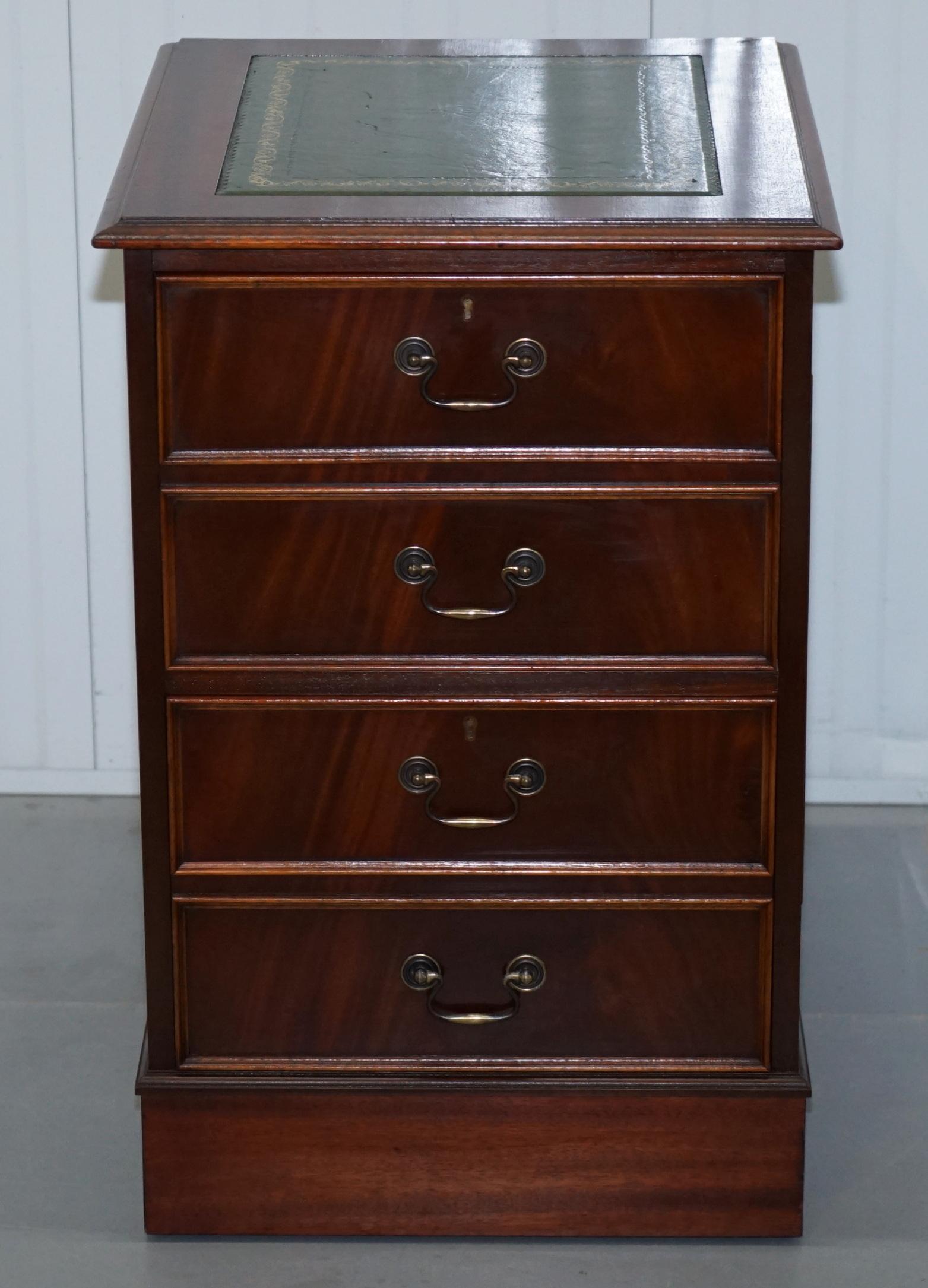 We are delighted to offer for sale this lovely Mahogany with green leather writing surface filing cabinet

The green leather writing surface is gold tooled and it has a nice vintage patina to it as does the mahogany frame which is very heavy

In