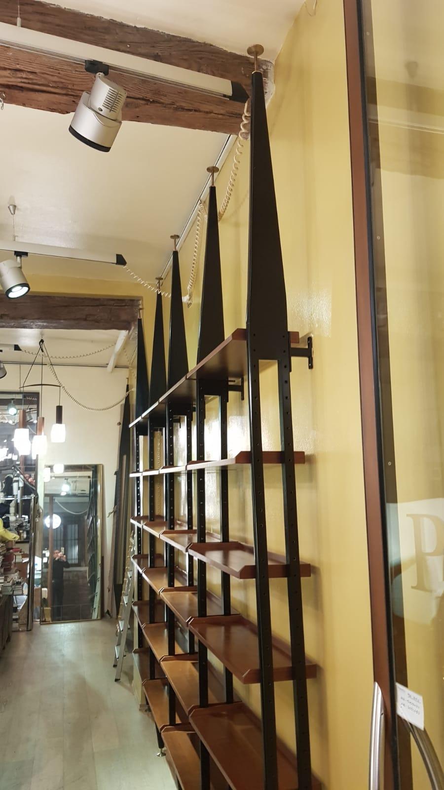 European Mahogany Wood Adjustable Shelves Six Black Metal Uprights Bookcase, Italy, 1950s