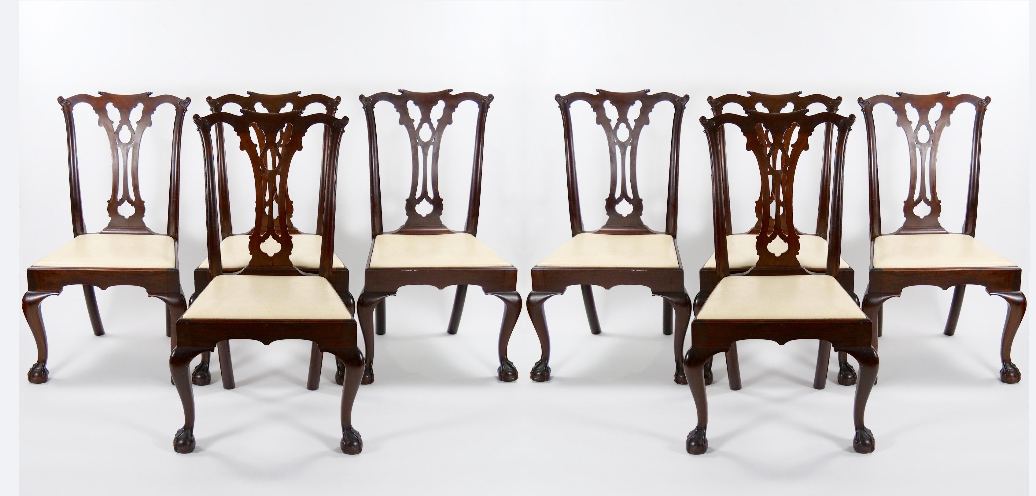 Enhance your dining space with this captivating set of eight antique Mahogany Dining Chairs, designed in the distinguished English Chippendale style. These chairs are more than just functional; they are a testament to classic design and