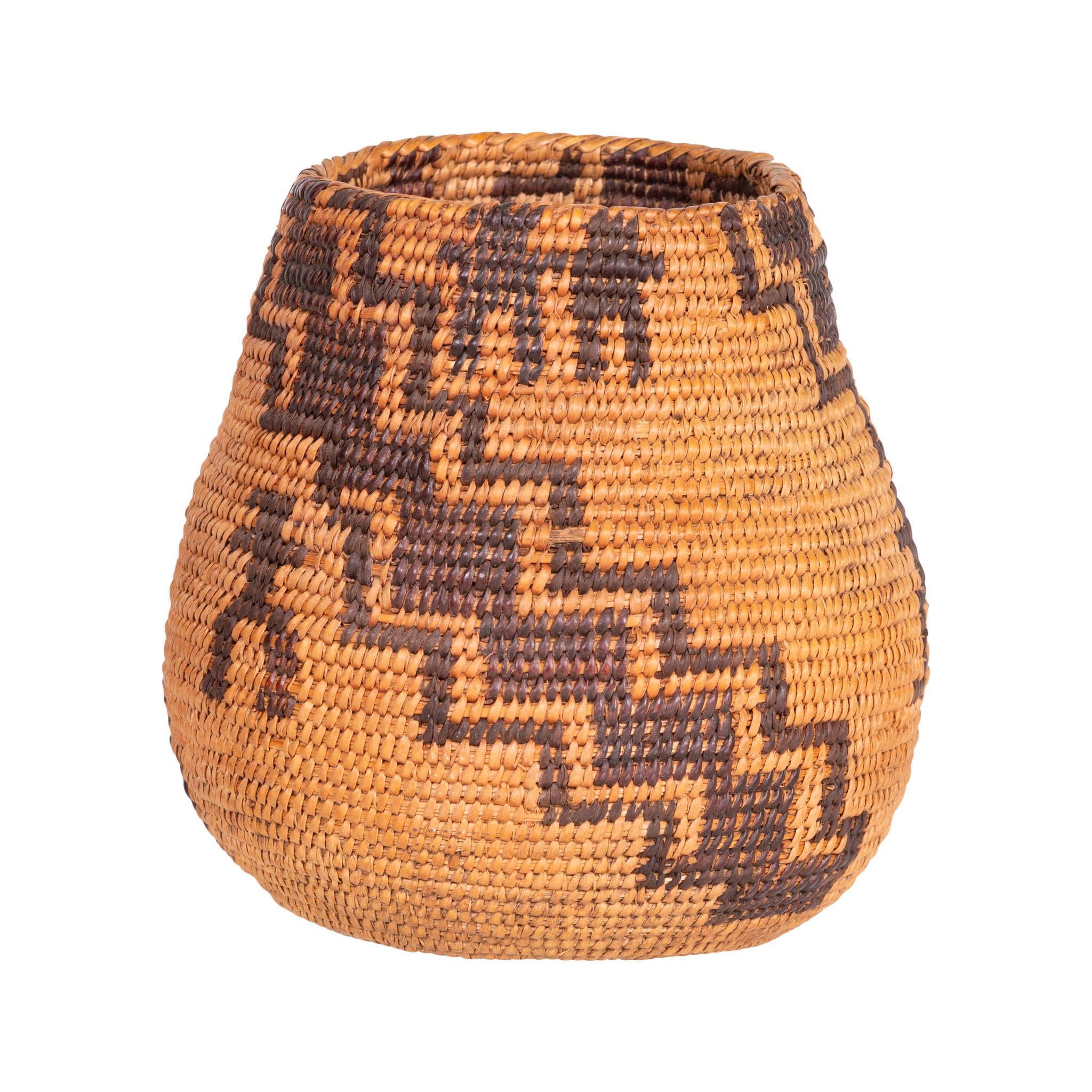 Maidu basketry gambling cup. Finely woven with stair step geometric design and humaoid figures.

Period: Last quater of the 19th century

Origin: California

Size: 4 1/2