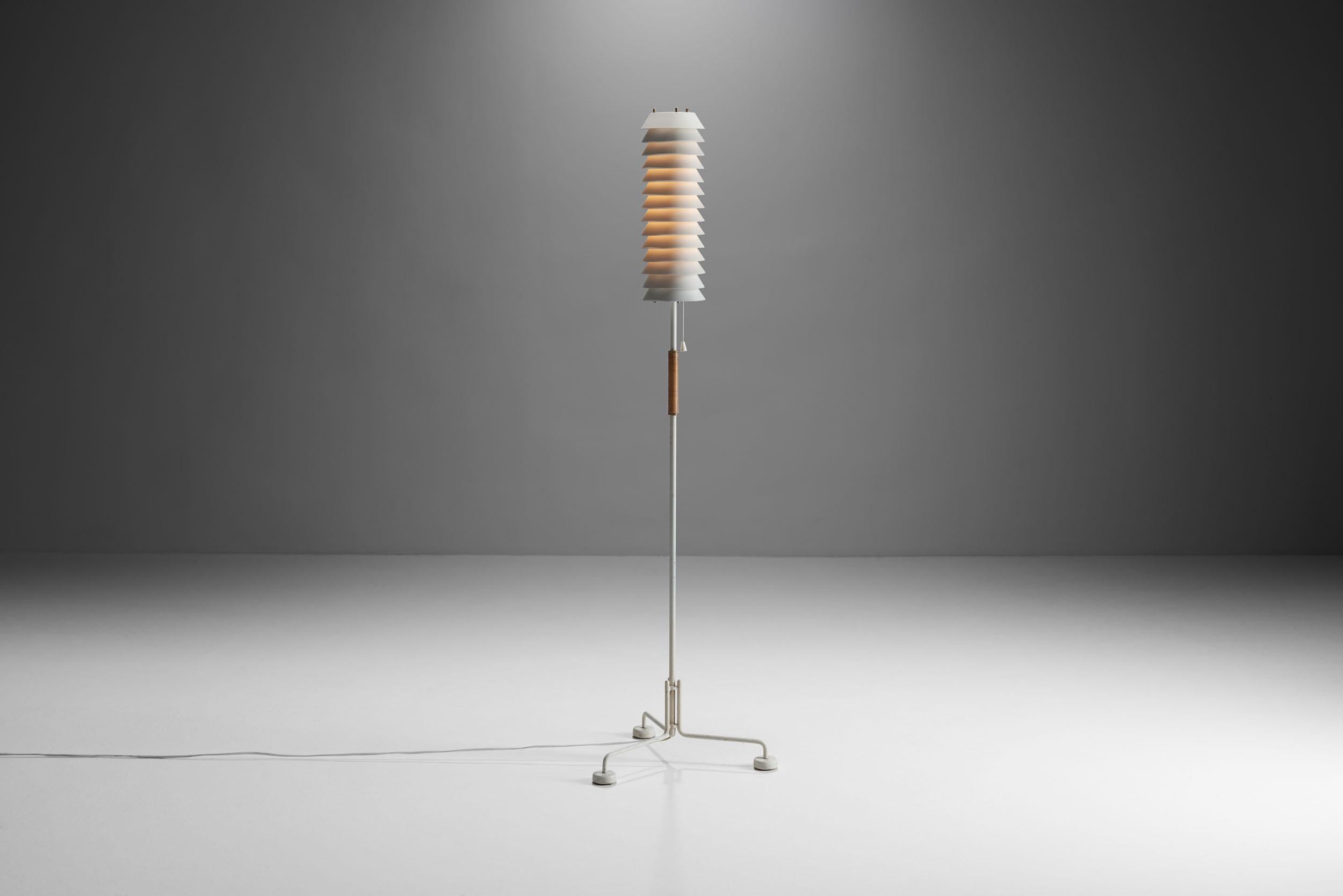 Designed in 1955, this Maija Mehiläinen (Maya the Bee) floor lamp is a simple, yet elegant piece. Tapiovaara's inspiration for this household lamp came from Maya the Bee herself, a friendly character from a 1912 German children’s book, that was also