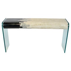Mailand Smith tesselated console table floats on glass legs with chrome