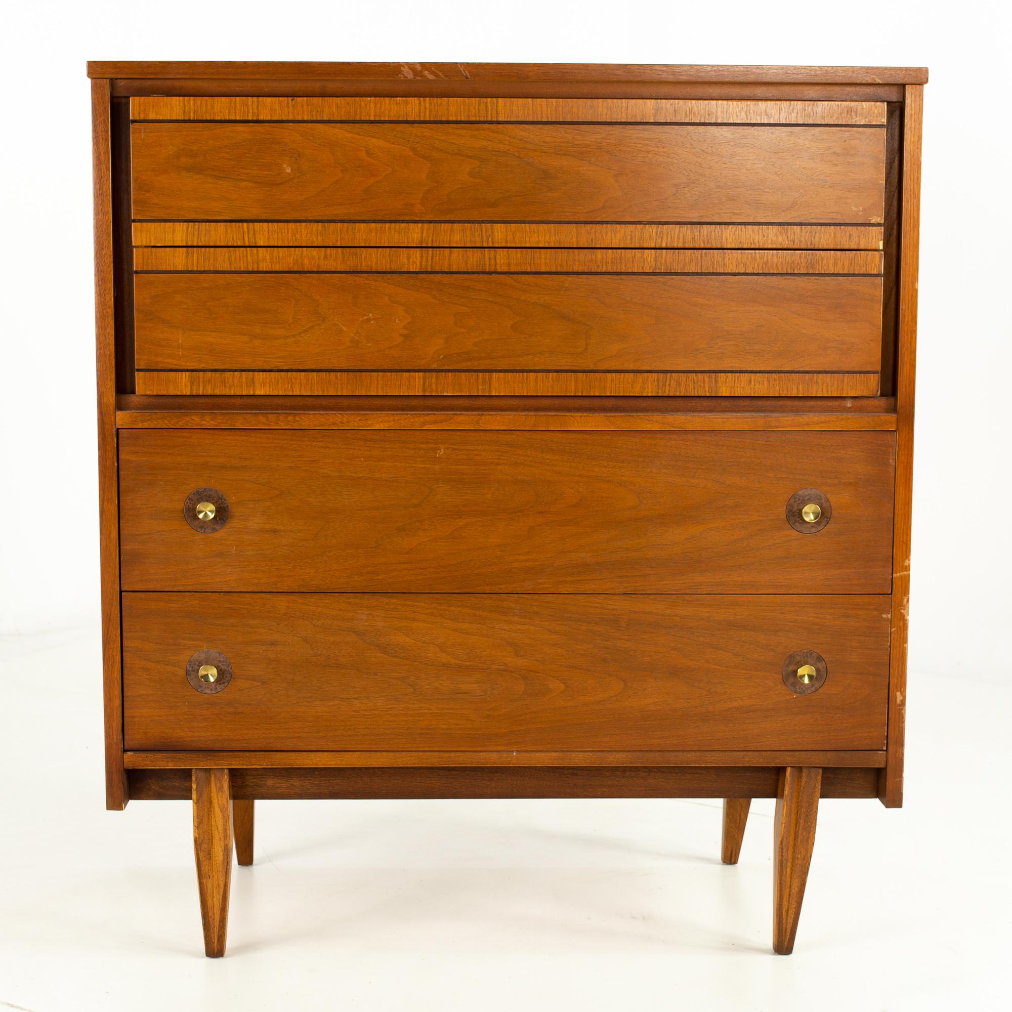 Mainline by Hooker Mid Century walnut and brass 4-drawer highboy dresser
Measures: 38 wide x 18 deep x 44.25 high

This price includes getting this piece in what we call restored vintage condition. That means the piece is permanently fixed upon