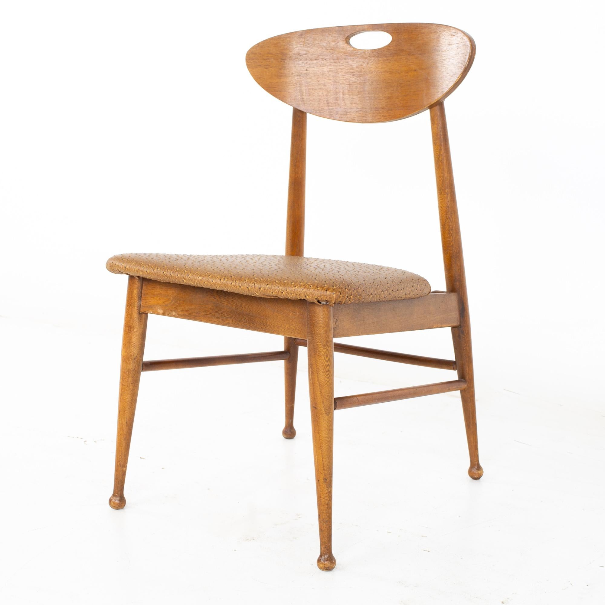 Mainline by Hooker mid century walnut desk dining chair.
Chair measures: 18.5 wide x 19.5 deep x 33.5 high, with a seat height of 16 inches

All pieces of furniture can be had in what we call restored vintage condition. That means the piece is