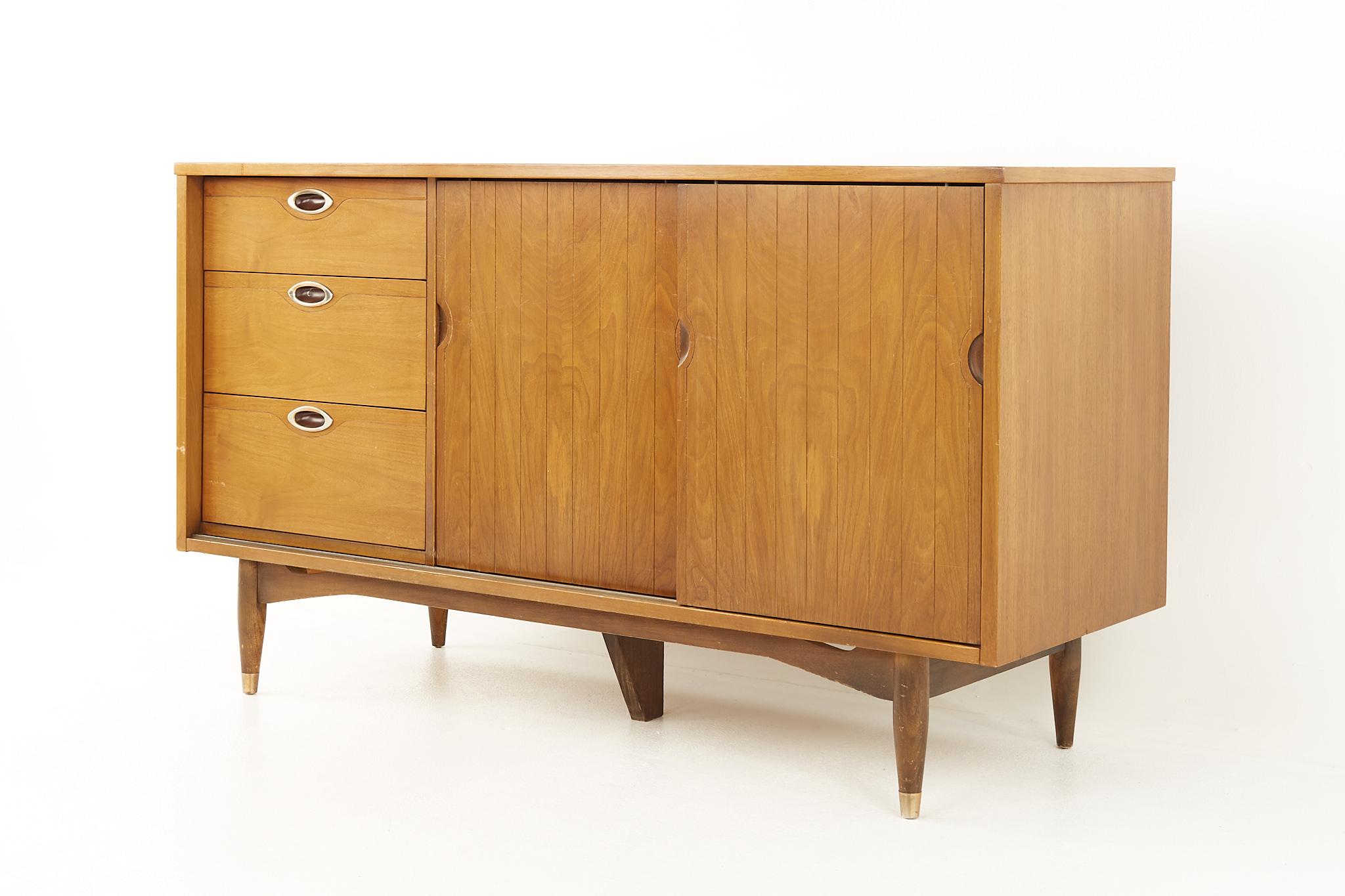 Mid-Century Modern Mainline by Hooker Mid Century Walnut Sliding Door Credenza