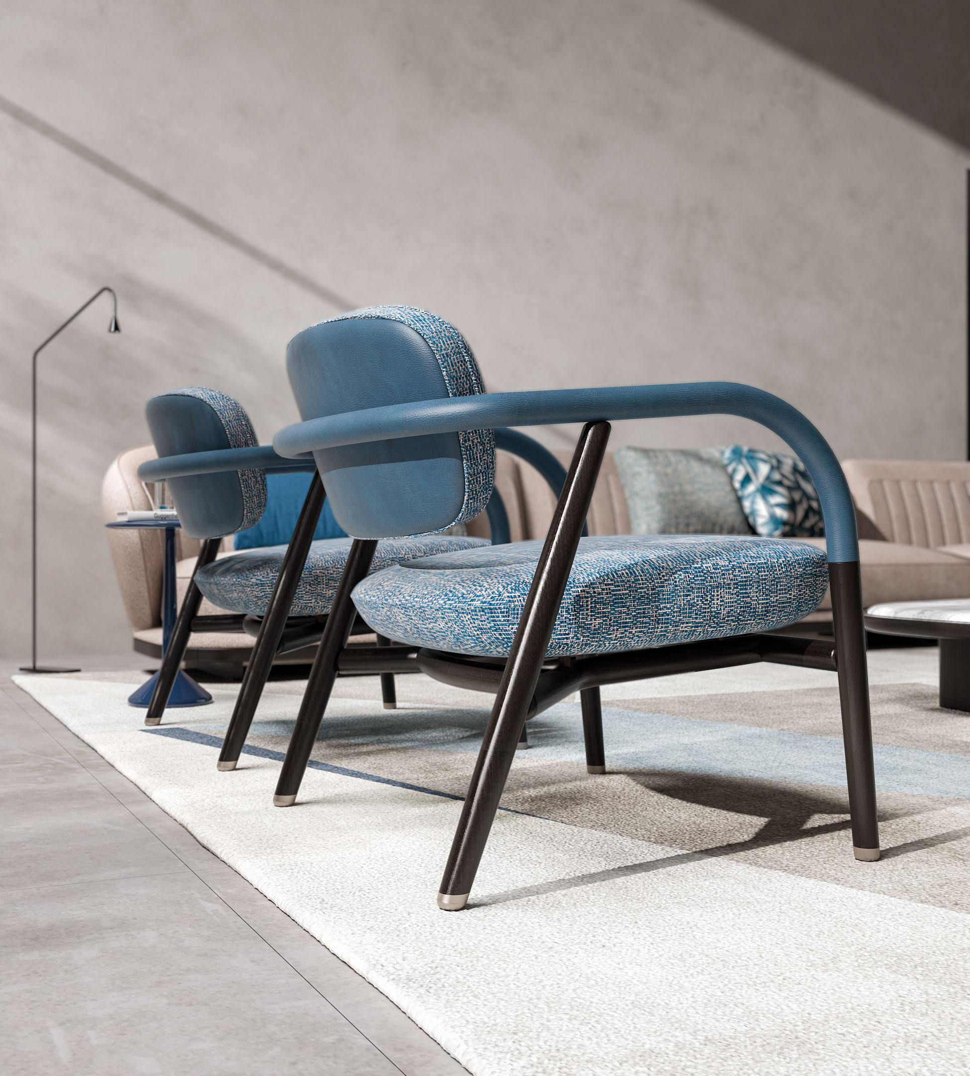 The Maiori occasional armchair is a new way of decorating an interior environment.
Its smooth and tapering silhouette allows it to create harmony in a brand-new or existing ambience.
The refined and sapient use of the leather and the fabric gives