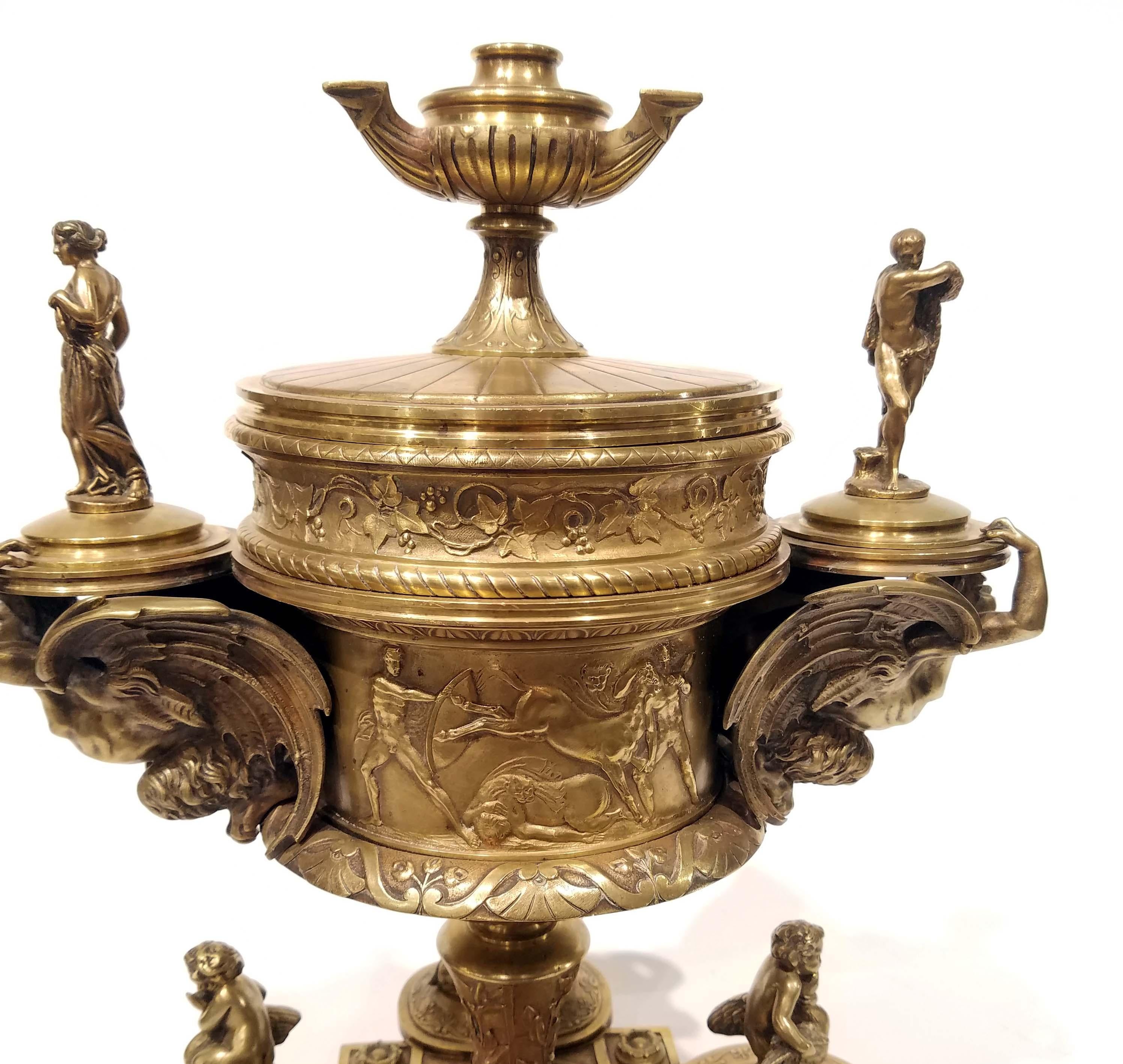 A rare Maison Alphonse Giroux cast bronze cigar container. Bronze cigar container in neoclassical motif circa late 19th century. Wonderful details with 2 winged devil figures flanking on either sides. 
