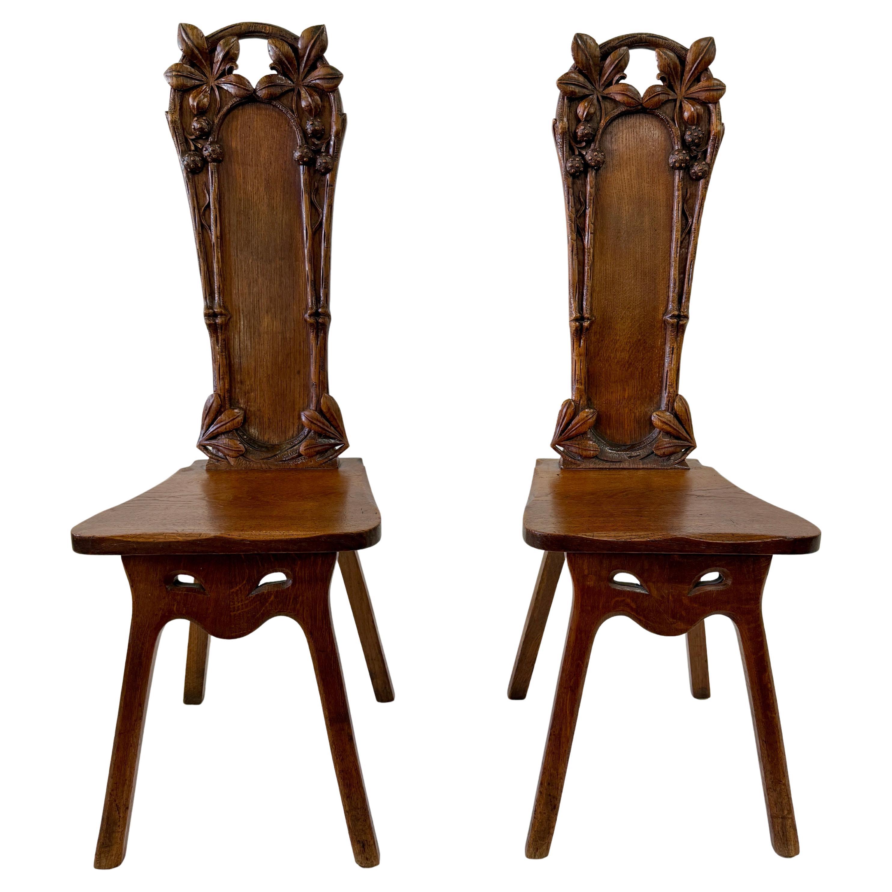 Maison Antoine Bastet Antique Carved Oak Hall Side Chairs, Pair For Sale