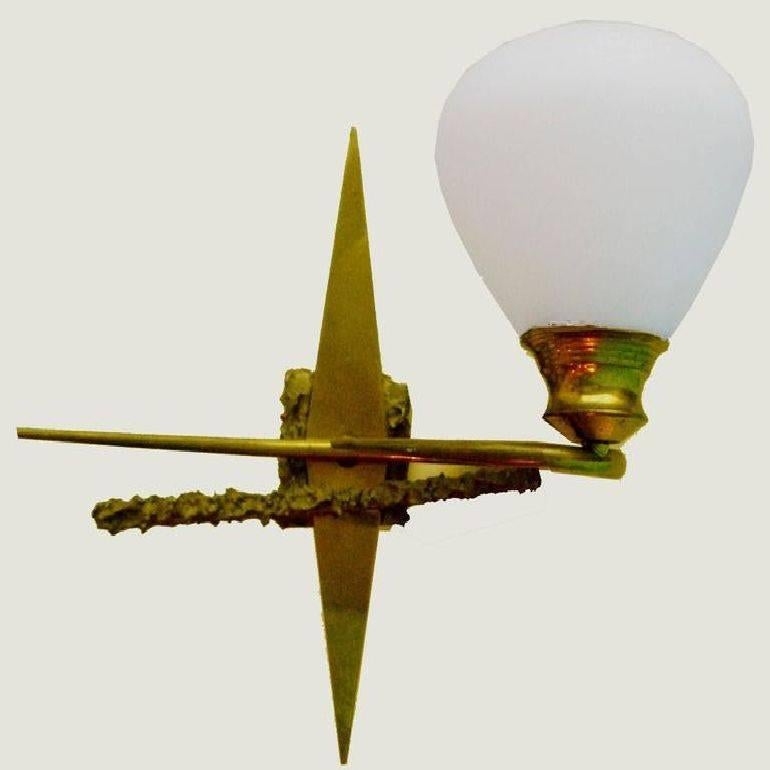 A gorgeous pair of sconces by Maison Arlus, bronze and brass and opaline glass. US rewired and in working condition. 65 watt max bulb. Measure: Back plate 3