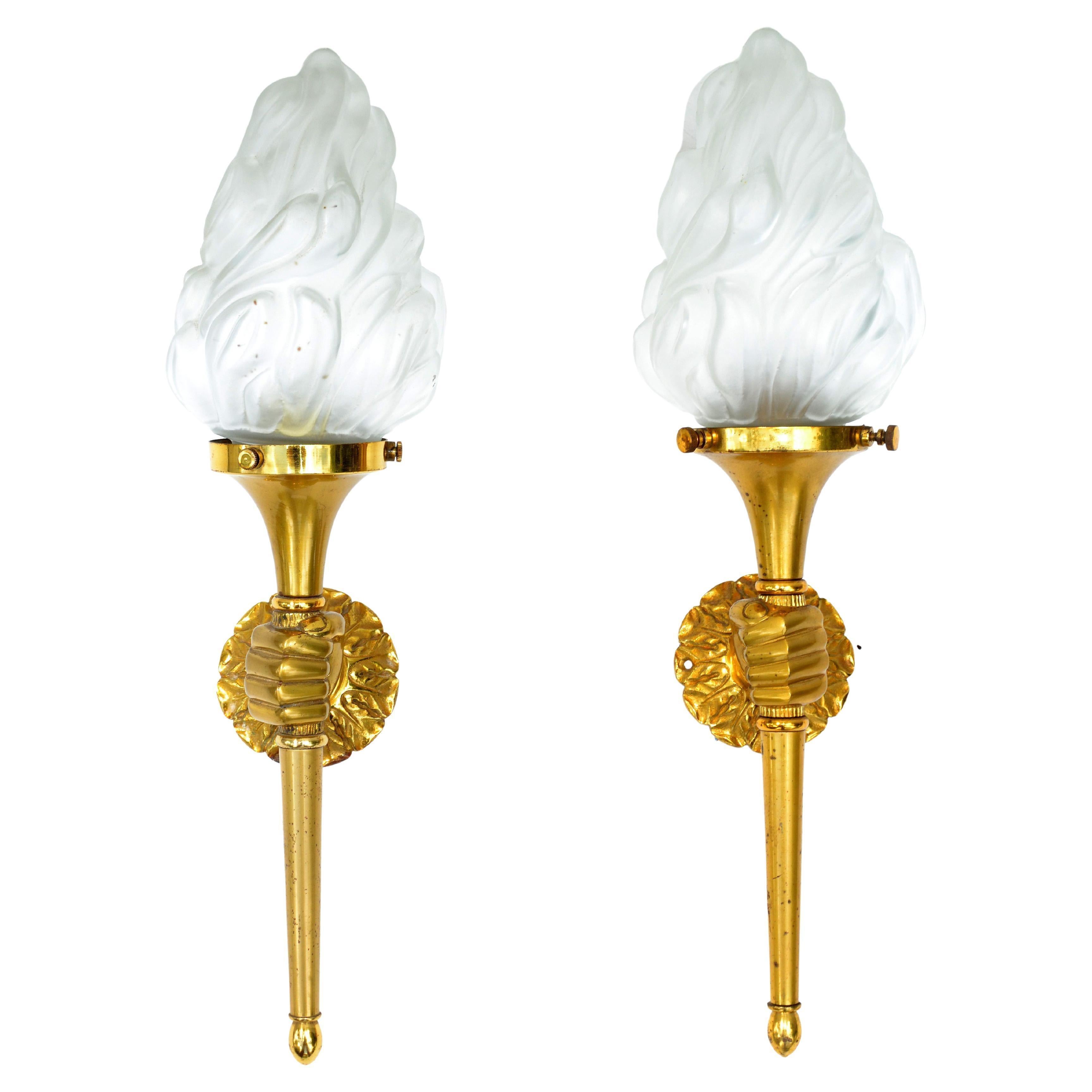 Superb pair of Maison Arlus hand sconce holding a Torch topped with blown glass shade.
Perfect working condition and each Wall Light takes 1 light bulb with max 40 watts. 
Back Plate measures: 3 inches Diameter. Custom back plate available.
Have