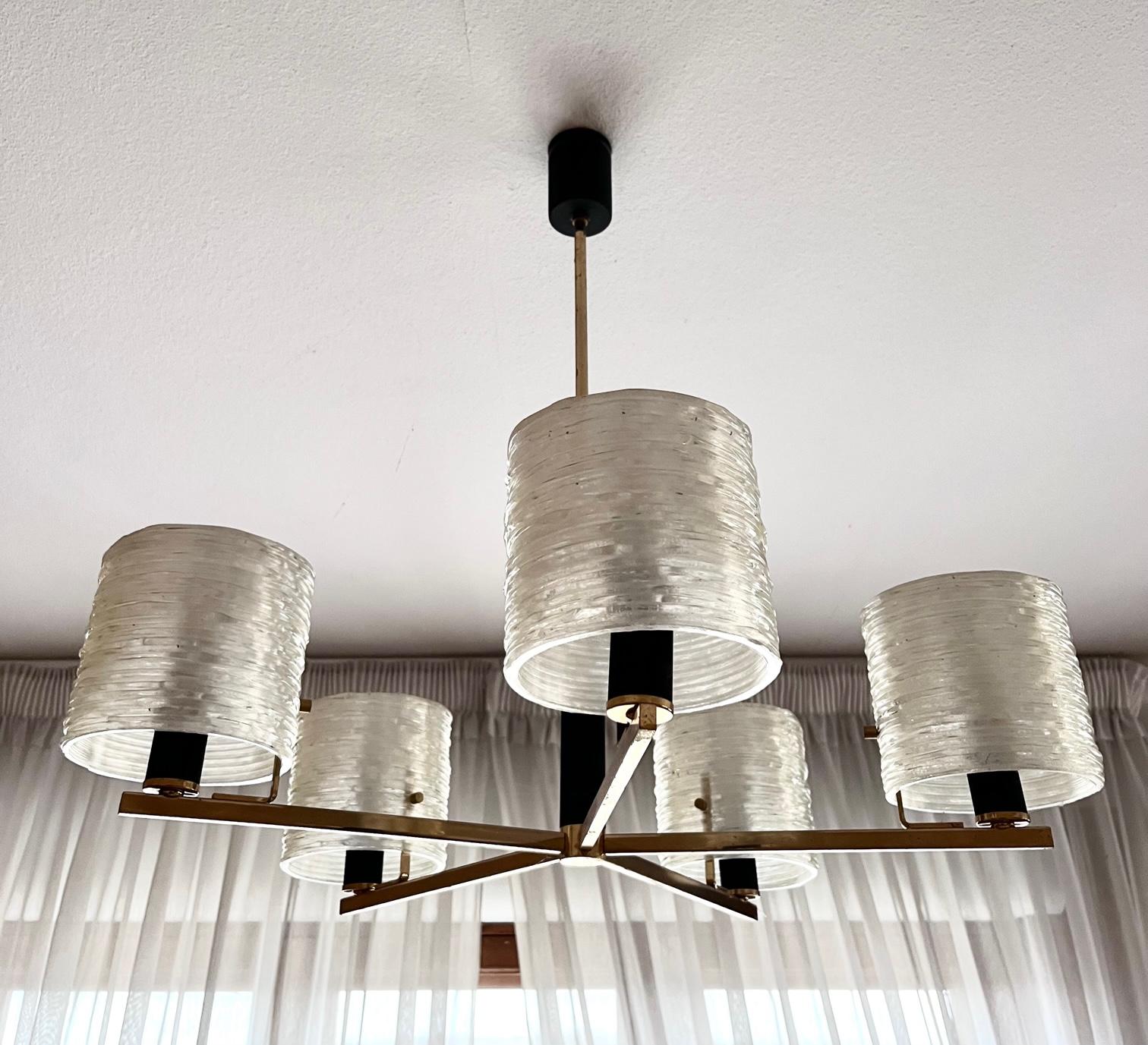 Beautiful fixture made by Maison Arlus in the 1950's 
Structure in gilden metal and shade in pearly shades that turns the room in a warm atmosphere when the light is turned on.