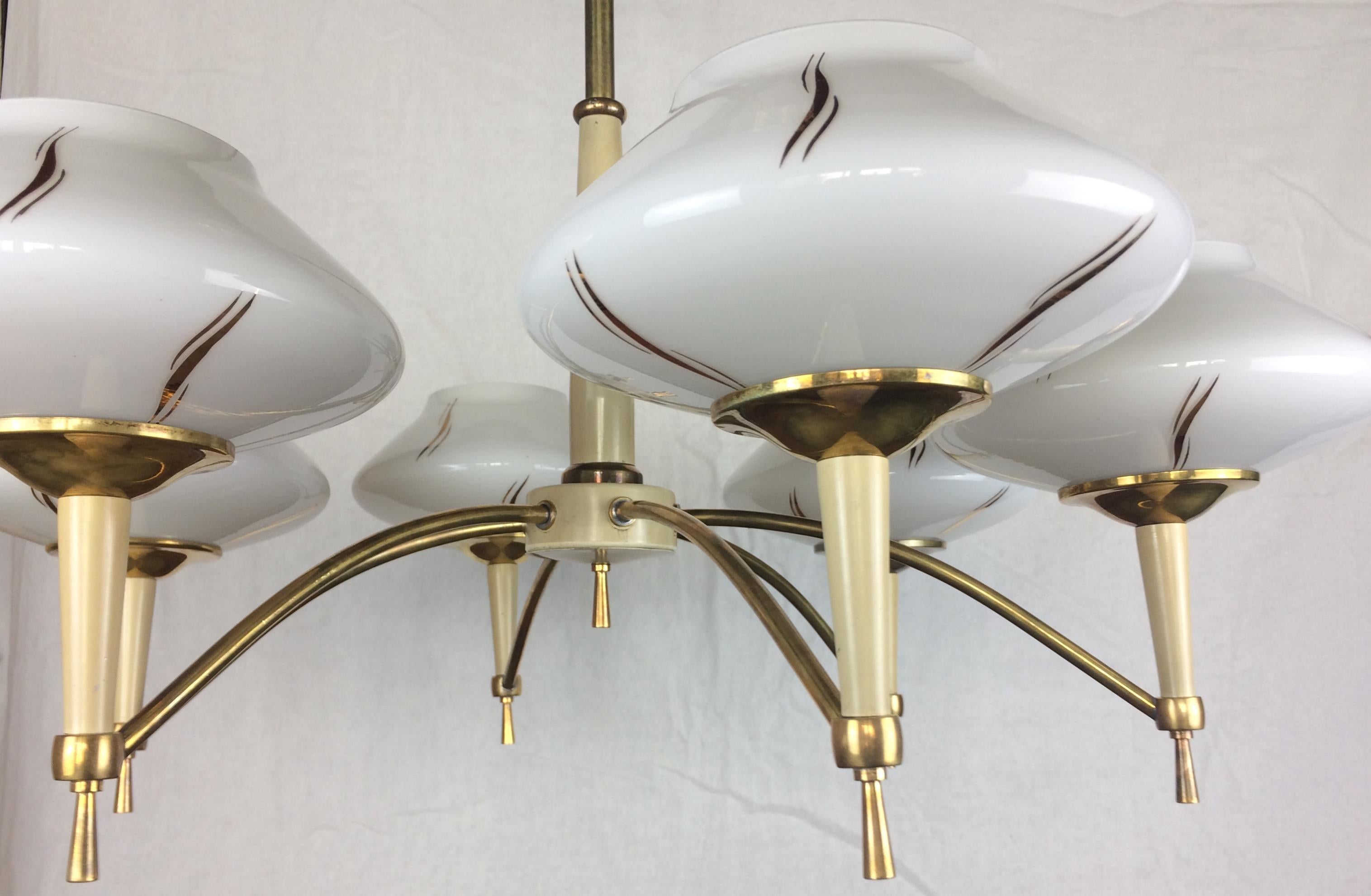 Original Maison Arlus designed chandelier produced in France, circa 1950s.
The peculiarity that distinguishes this chandelier is its innovative form of that period, mounted on a single brass axis with 6 opaline globes. 

Very good vintage condition.