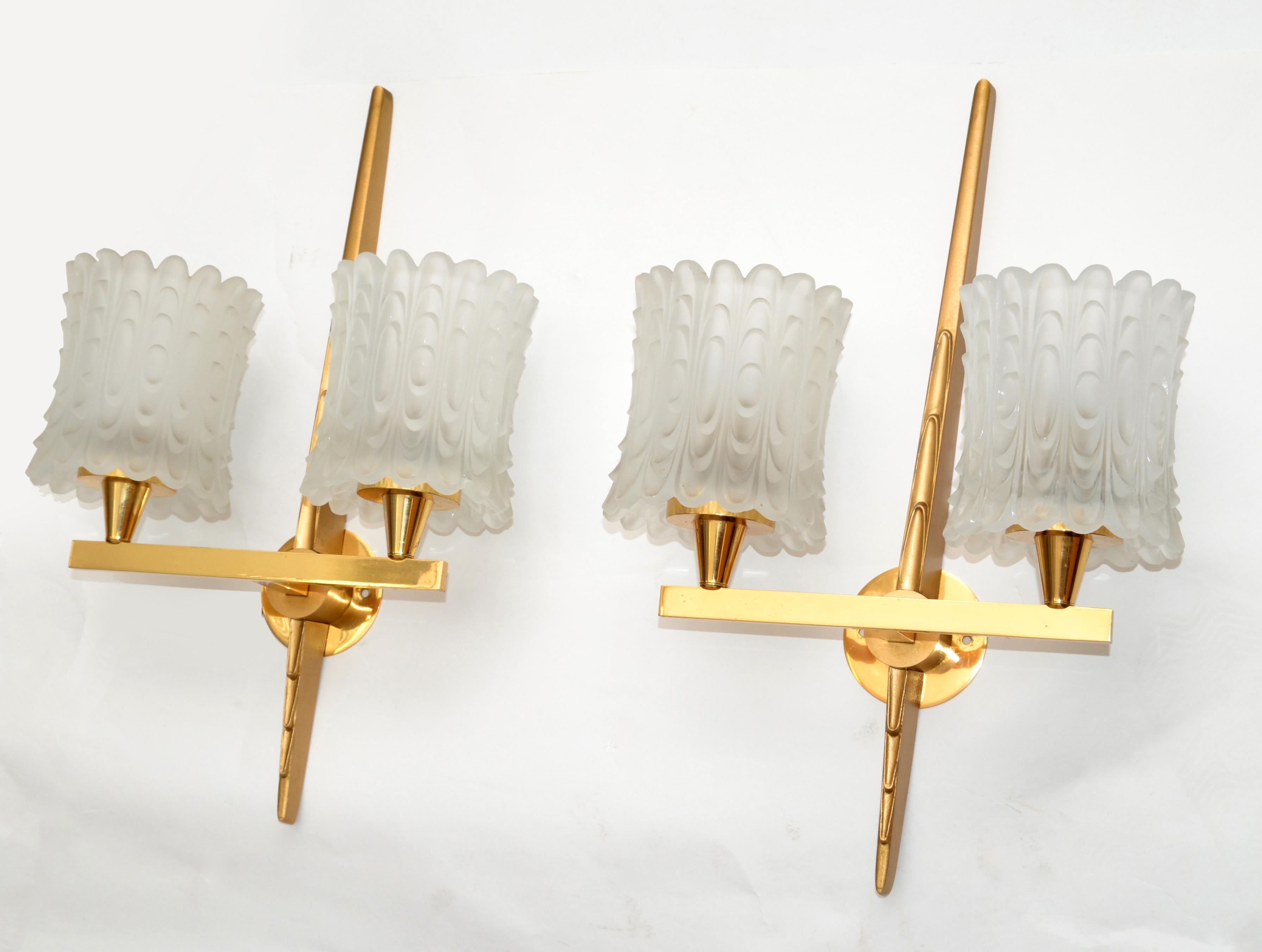 Art Deco impressive pair of Maison Arlus double brass & textured glass shade sconces.
In perfect working condition two lights per sconce, max 60 watts per socket.
Heavy textured glass shade measures:
Diameter: 5 inches, height: 4.5 inches.
Round