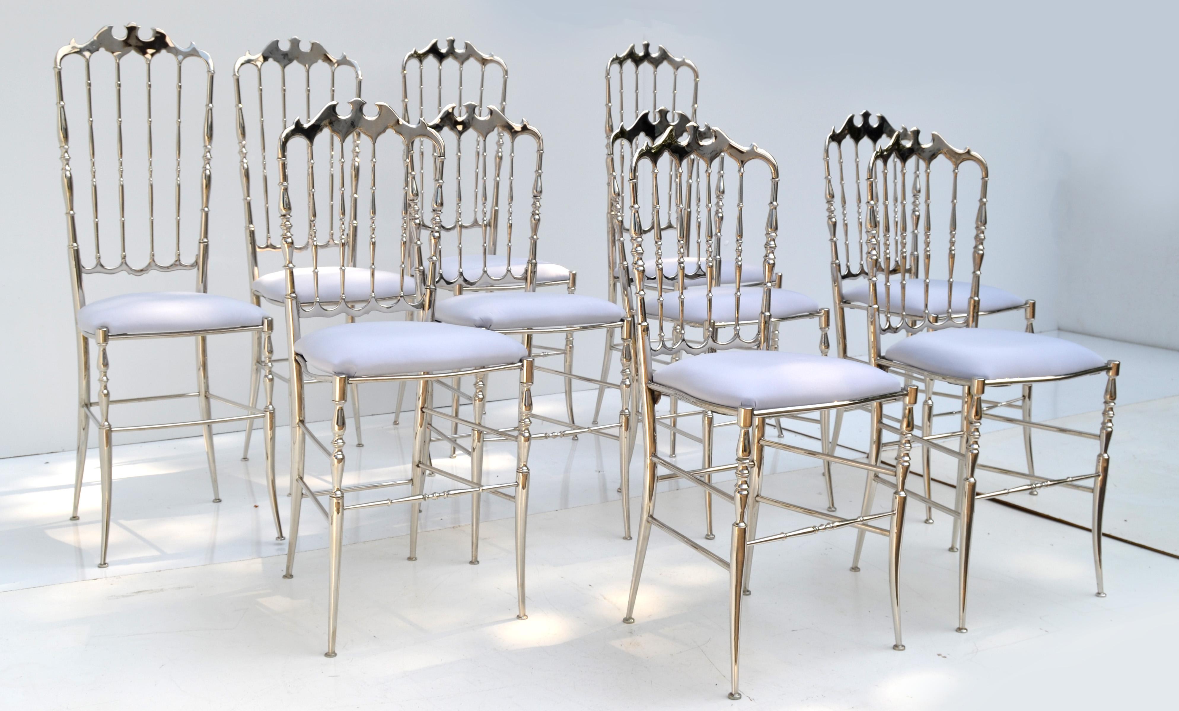 Exceptional set of ten Italian nickel-plated over Brass Chiavari chairs.
Consisting out of 6 Dining Chairs and 4 high back Side Chairs.
New light violet silk upholstery.
Similar chairs are at the 