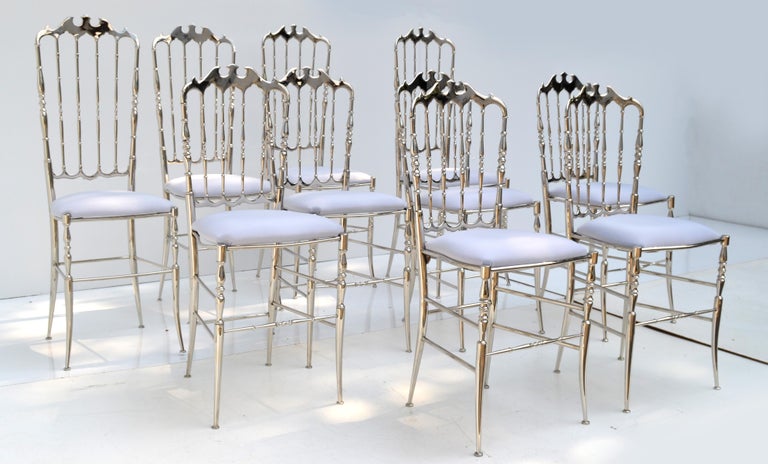 Exceptional set of ten Italian nickel-plated over Brass Chiavari chairs.
Consisting out of 6 Dining Chairs and 4 high back Side Chairs.
New light violet silk upholstery.
Similar chairs are at the 