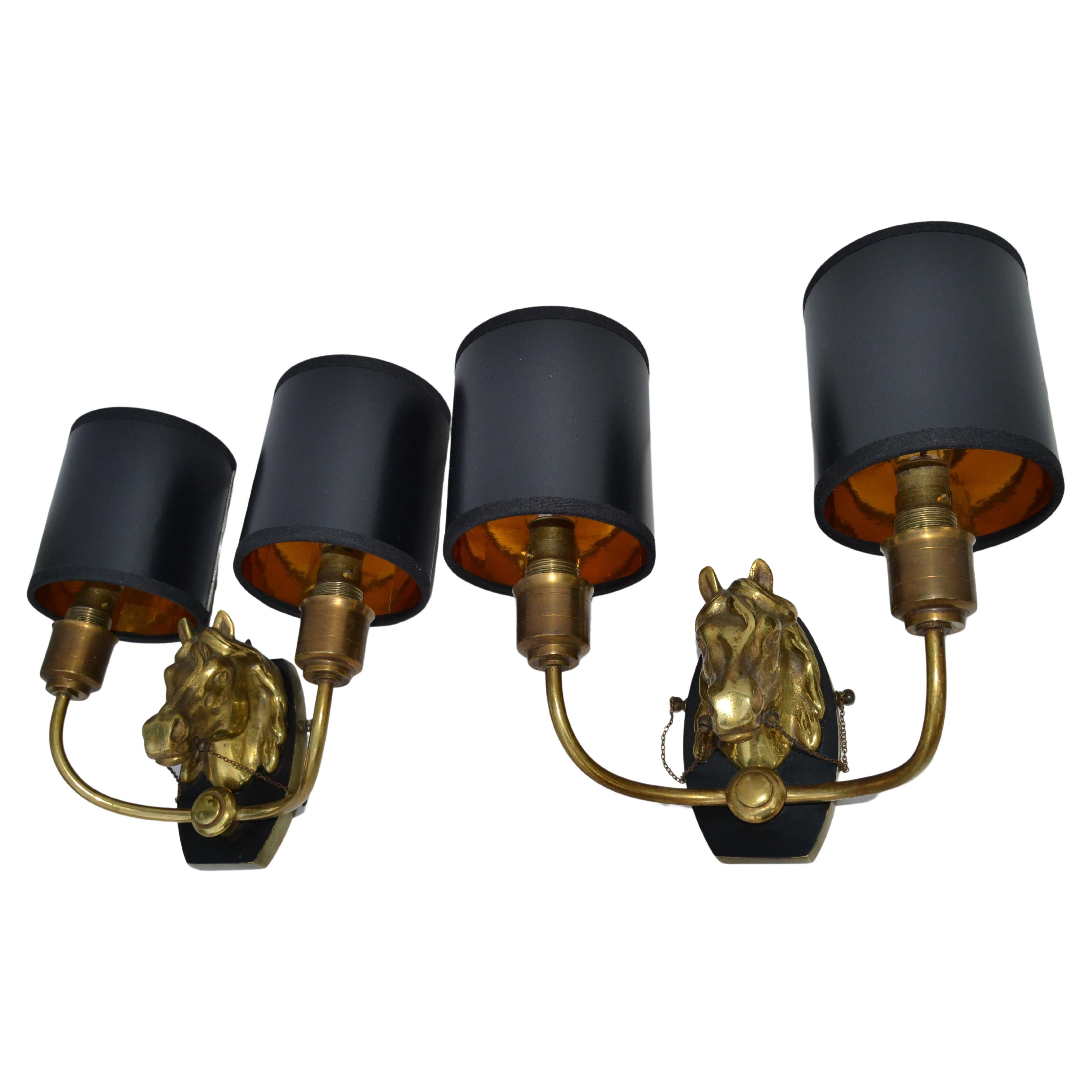 Superb pair of Maison Baguès Horse sconces, Wall lights in 2 patina bronze.
2 Lights, 40 watts max bulb per light 
In working condition and each Sconce takes 2, 60 watts Candelabra or LED Bulbs.
Custom back-plate available.
Measures: back-plate: