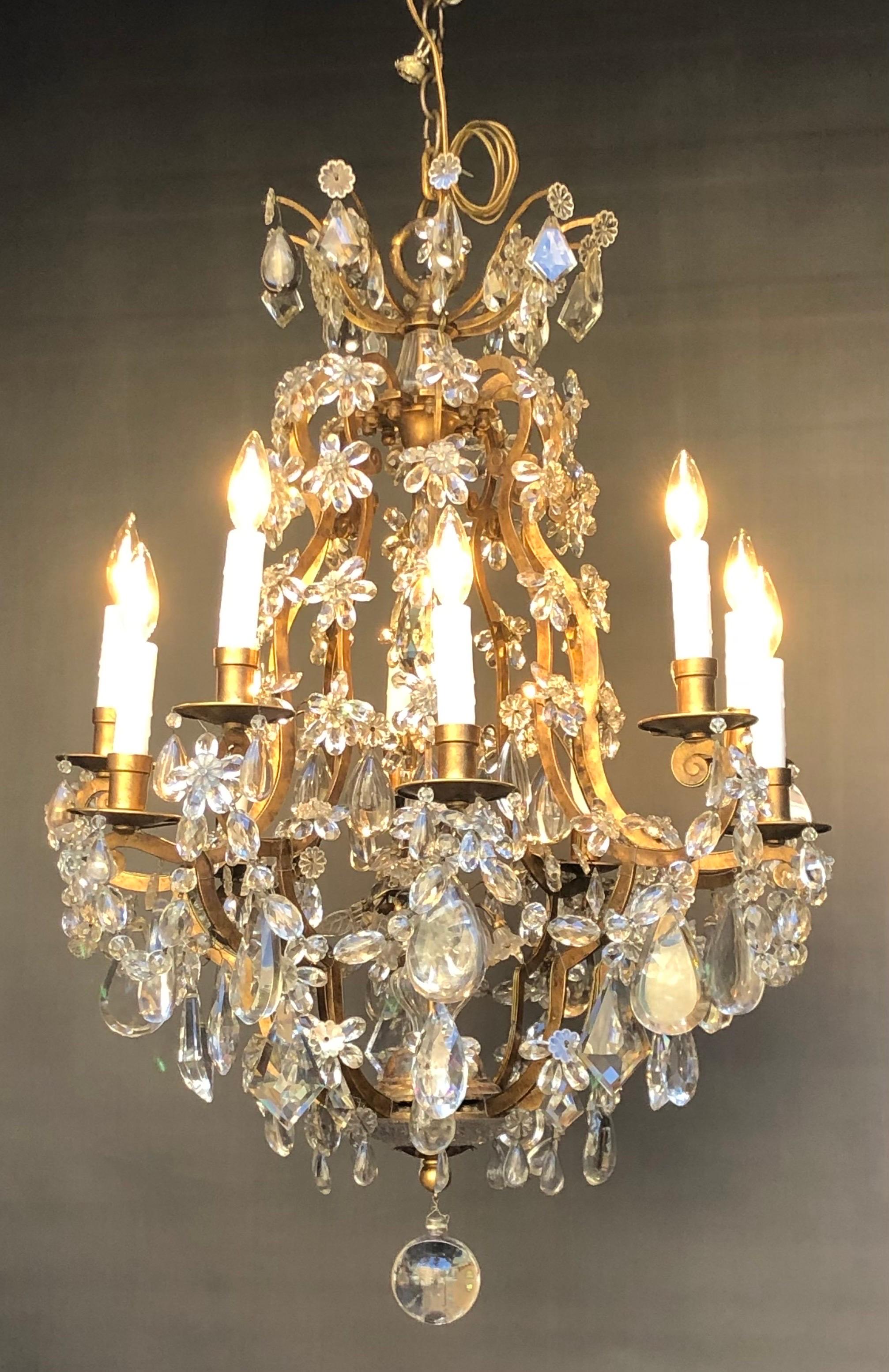 French Maison Baguès attributed, Wrought Iron Gilt & Crystal 10 Light Chandelier For Sale