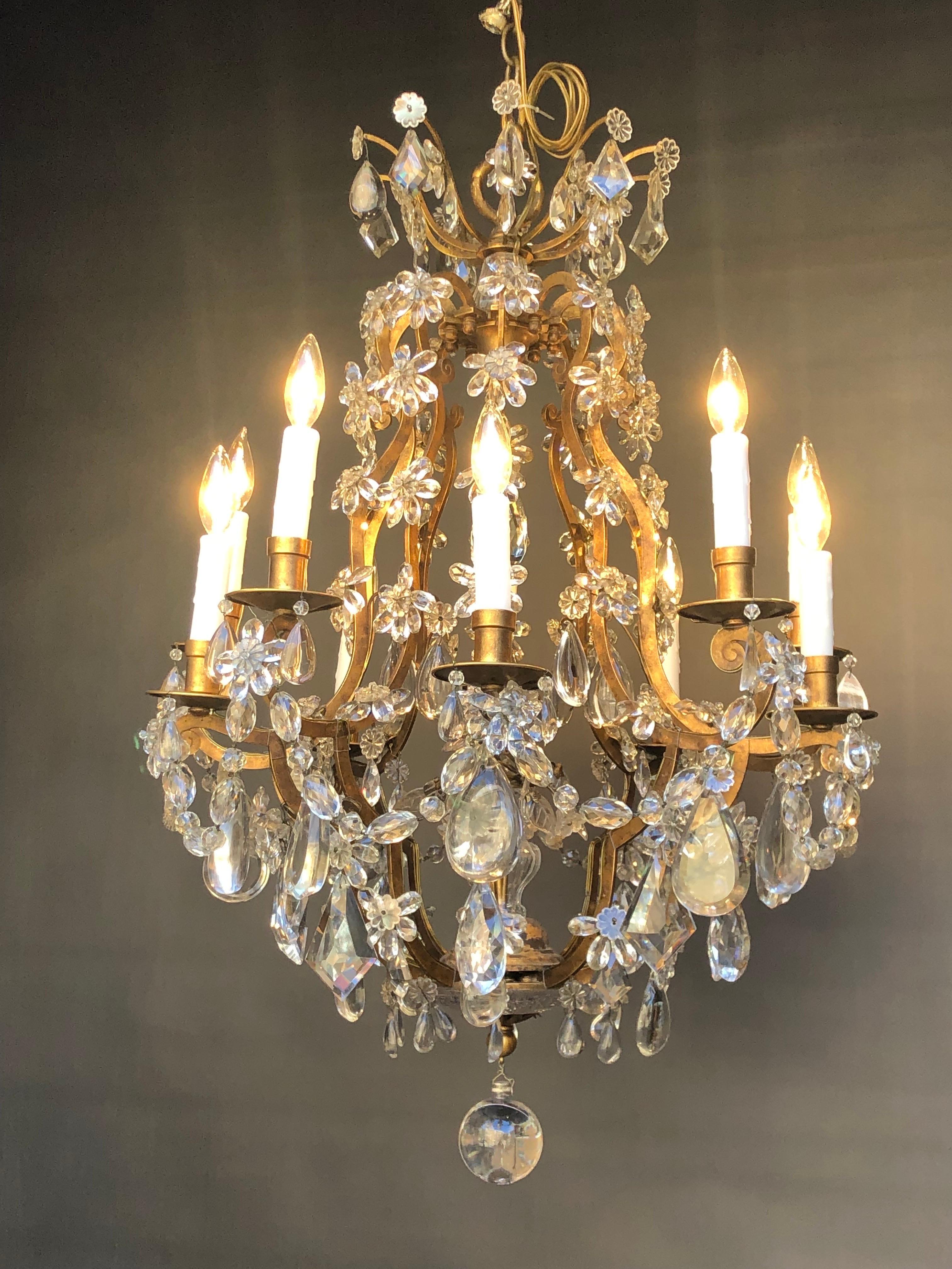20th Century Maison Baguès attributed, Wrought Iron Gilt & Crystal 10 Light Chandelier For Sale