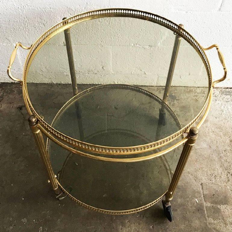 Superb bar cart made by Maison Bagués 2 tiers serving tray is removable with clear glass.