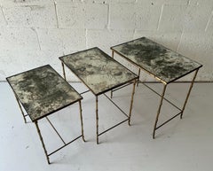 Maison Baguès Bronze and cloudy mirror nesting tables