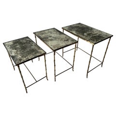 Maison Baguès Bronze and cloudy mirror nesting tables