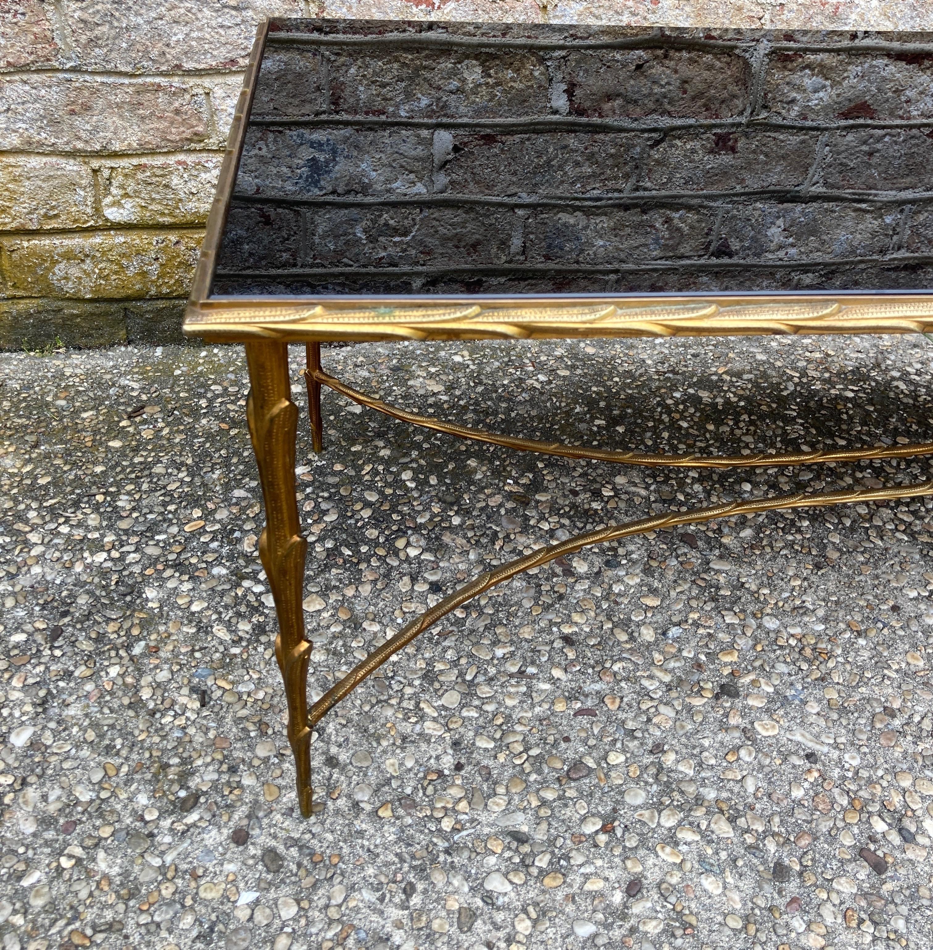 Timeless bronze palm frond framed coffee table by Maison Baguès with new reverse painted glass top...