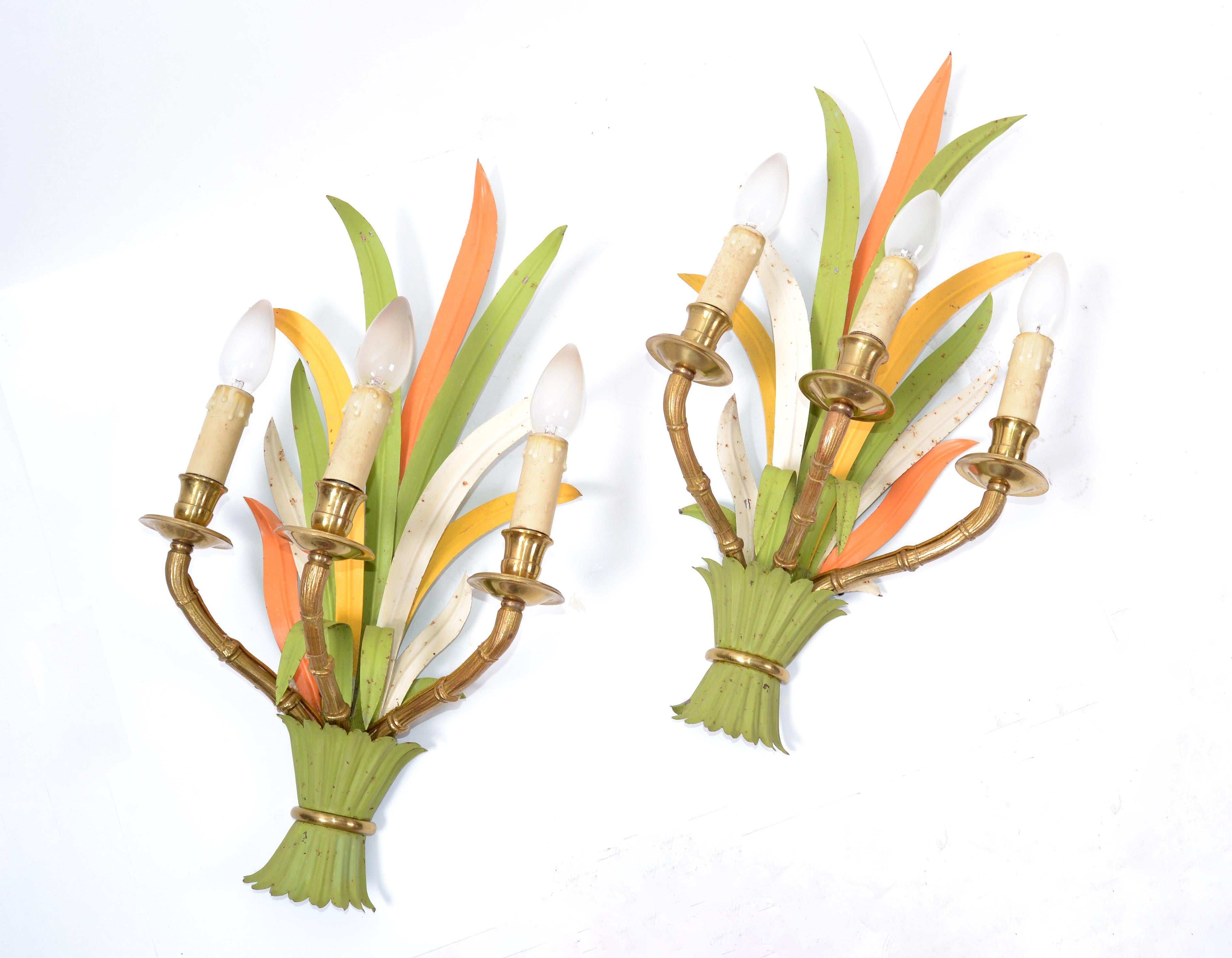 Superb pair of Maison Baguès 3 lights wall sconces in great bronze quality and colorful enamel.
Both came from the same house. Original foil label on the reverse, Baguès, Paris.
Perfect working condition and each sconce uses 3 European light