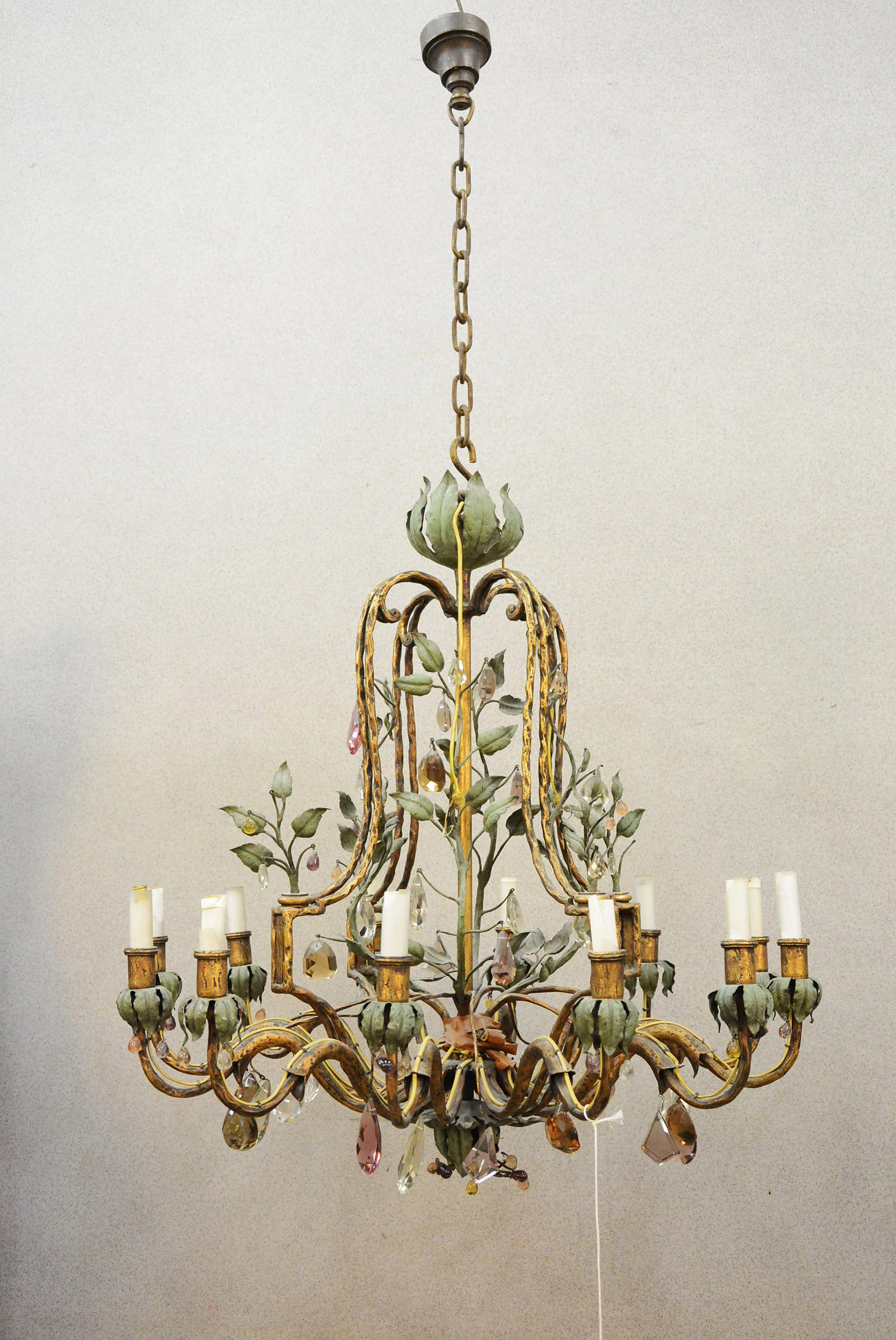 Maison Baguès, chandelier in crystal and lacquered gilt wrought iron, circa 1940.