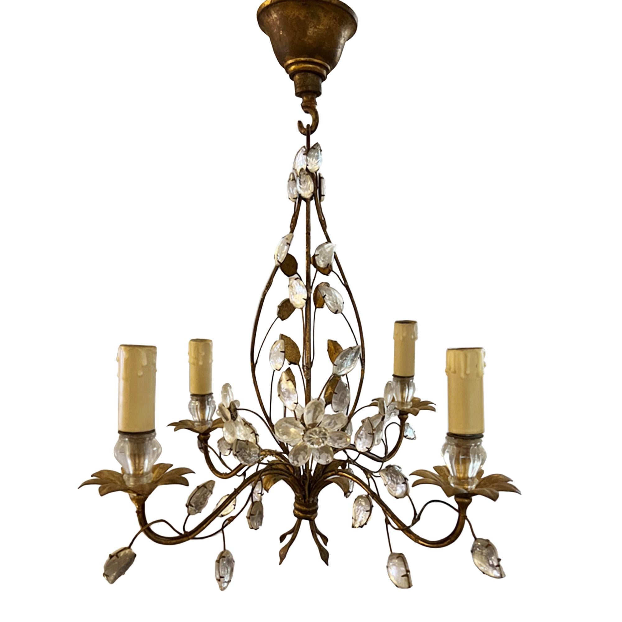 Wonderfully elegant mid 20th century gilt metal and crystal chandelier by Maison Baguès. Made in Paris in the 1960s.

This smaller light has 4 arms, with the light fitting in the shape of an open bud. Decorated with crystal leaves and flowers - this