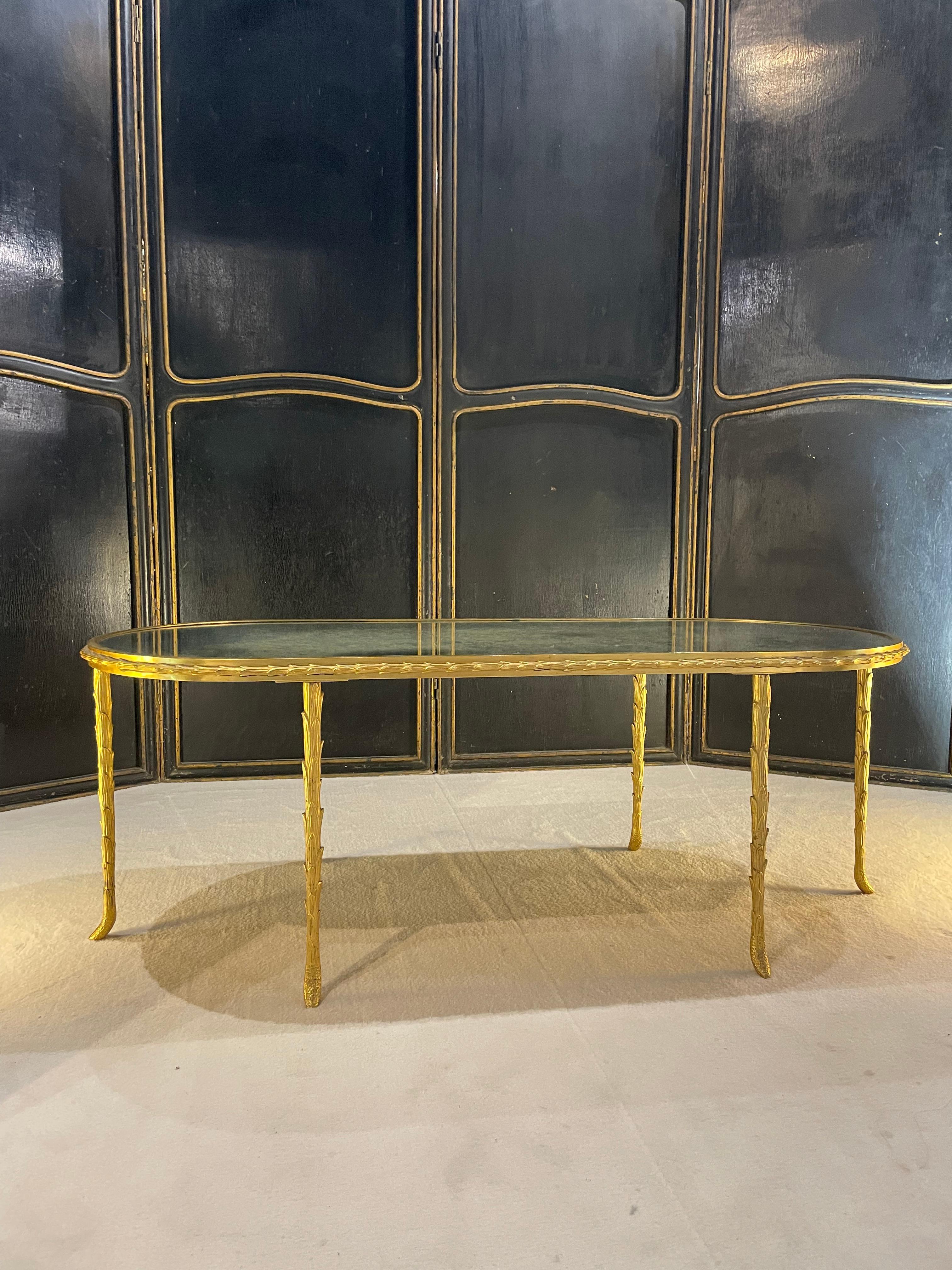 French Mid-century neoclassical cocktail table in solid gilt bronze Covered in mercury. The pieces are cast in bronze in the form of palm leaf.