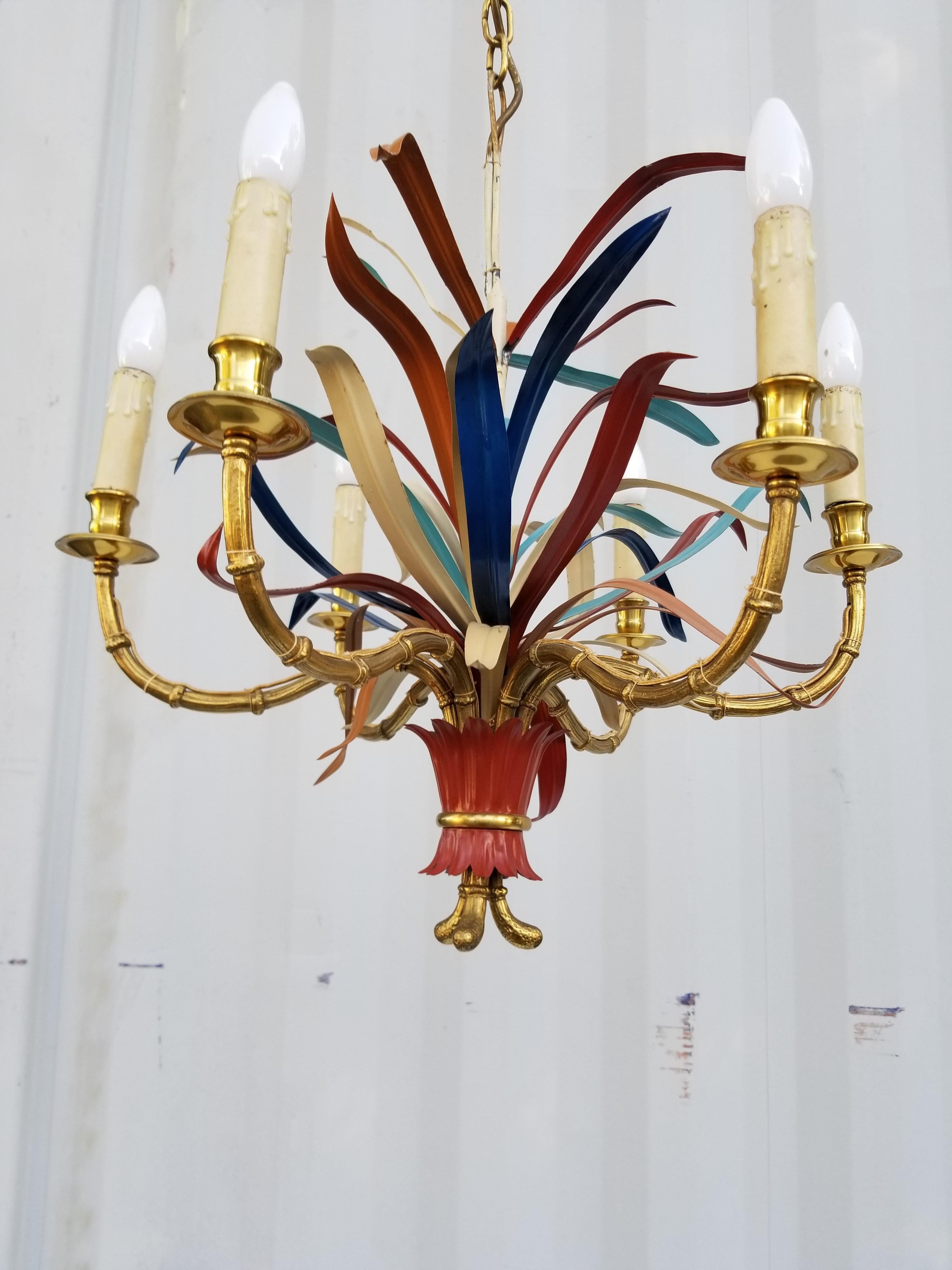 Superb Maison Baguès 6 lights chandelier, great bronze quality.
Matching pair of 3 light sconces, from the same house.