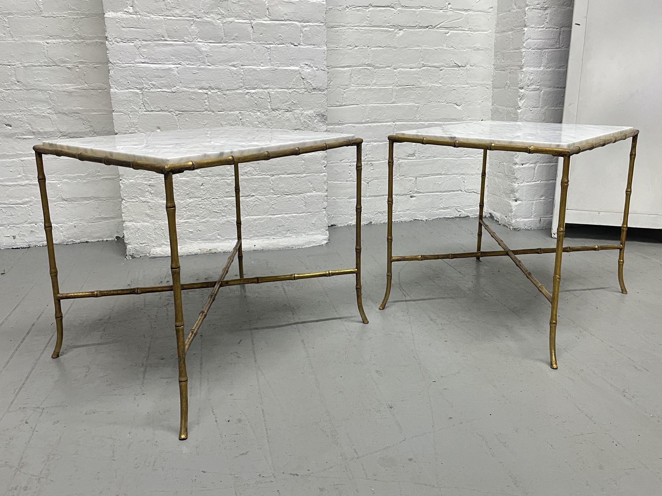Pair of French Maison Bagues Carrara marble top gilt iron faux bamboo end tables or side tables. The tables have 