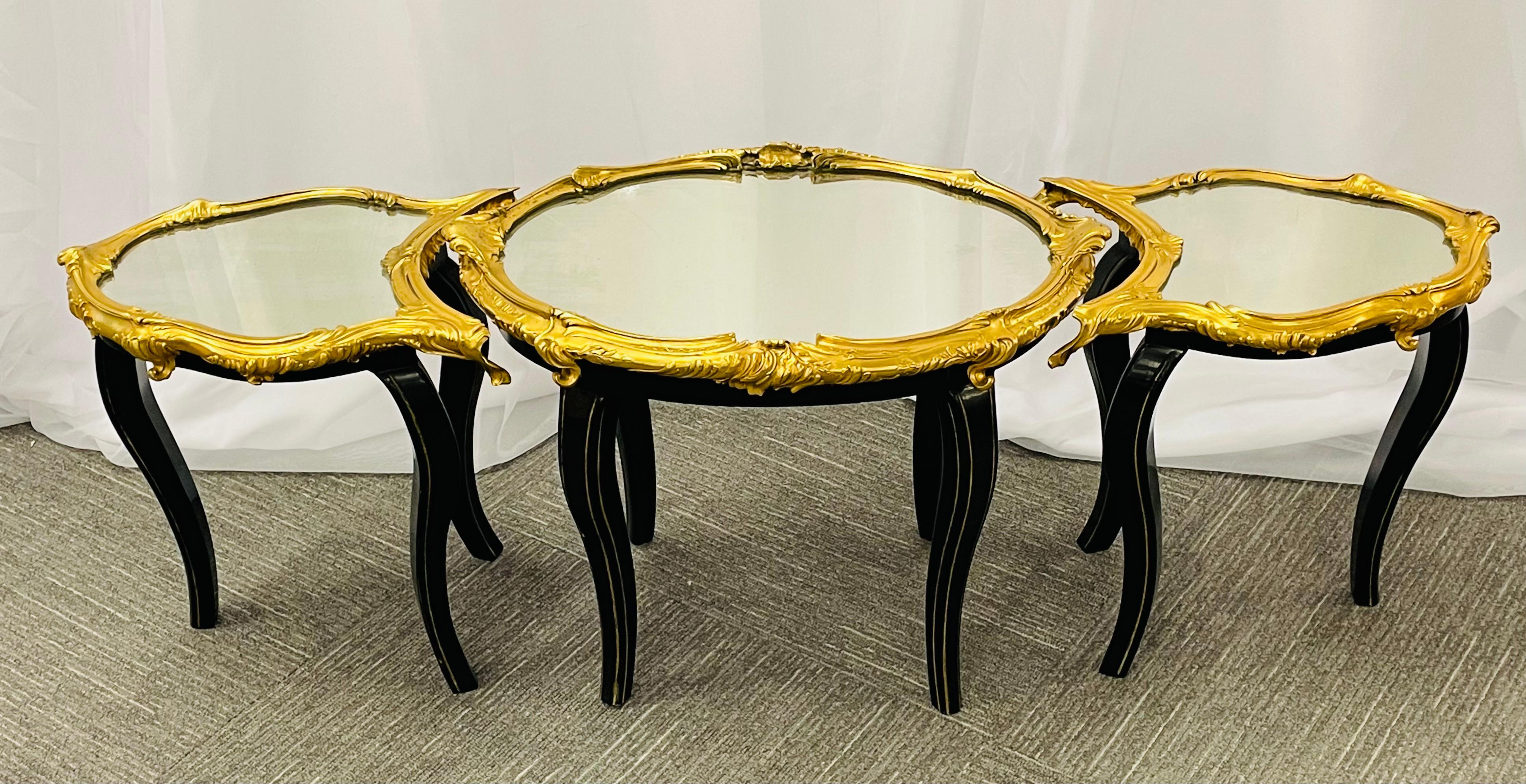 Maison Baguès Hollywood Regency coffee or low table. Ebony and bronze mounted. This is a stunning sleek and stylish coffee table having ebony legs on three-piece with a mirrored top set inside the finest bronze mountings. Can be use together as a