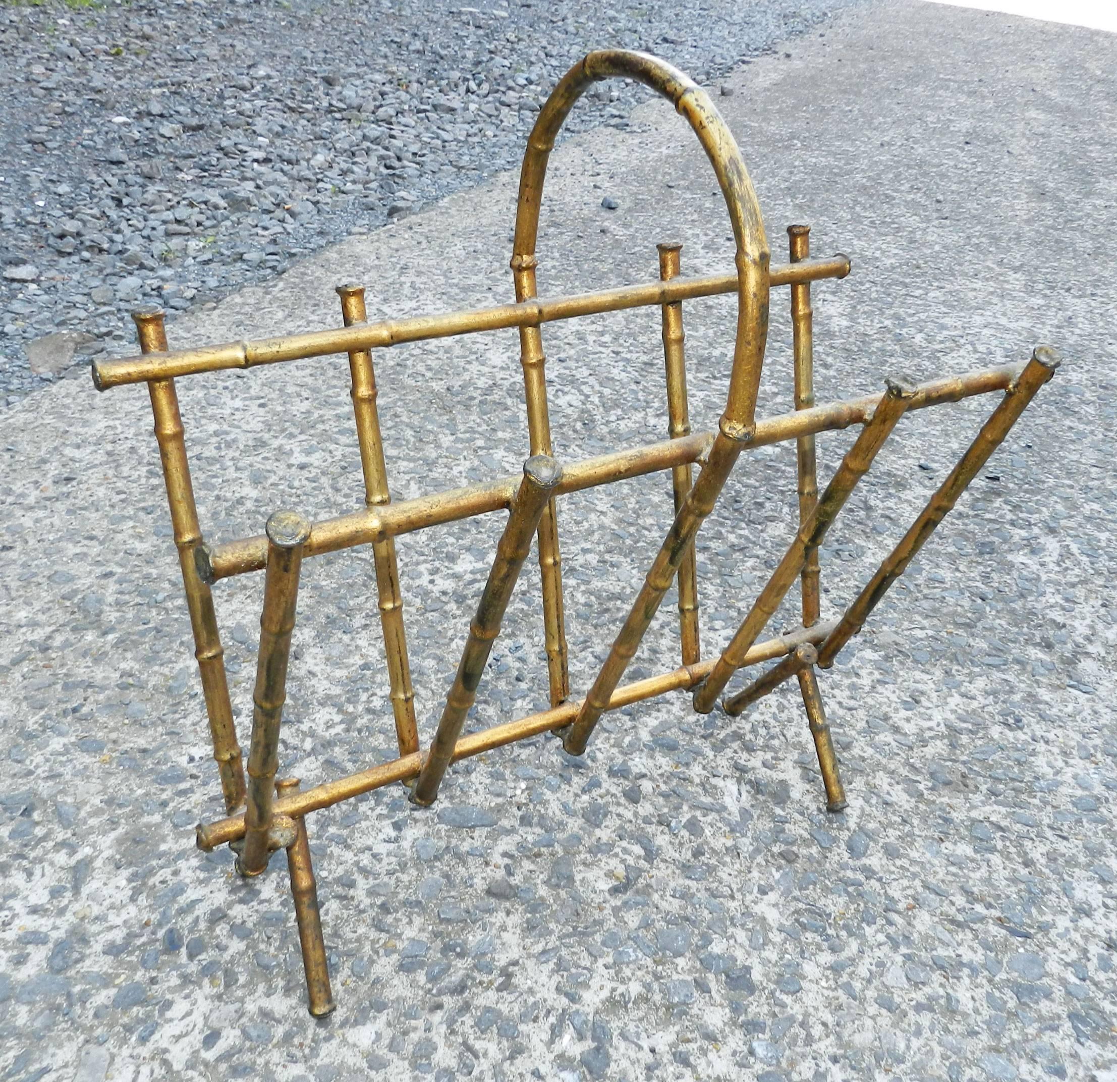 Maison Baguès, lacquered metal and imitation bamboo news paper rack.