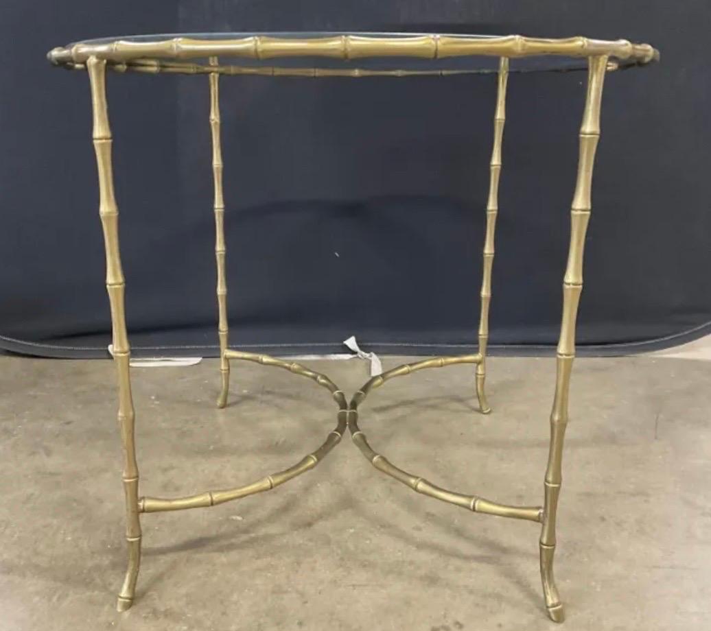 Wonderful Maison Baguès Mid-Century Modern round glass top, with faux brass / bronze bamboo style structure. 
Measures: 30