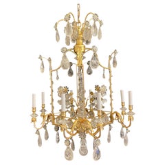 Maison Baguès Pair Louis XVI Large Rock Crystal Eight-Light Square Chandeliers