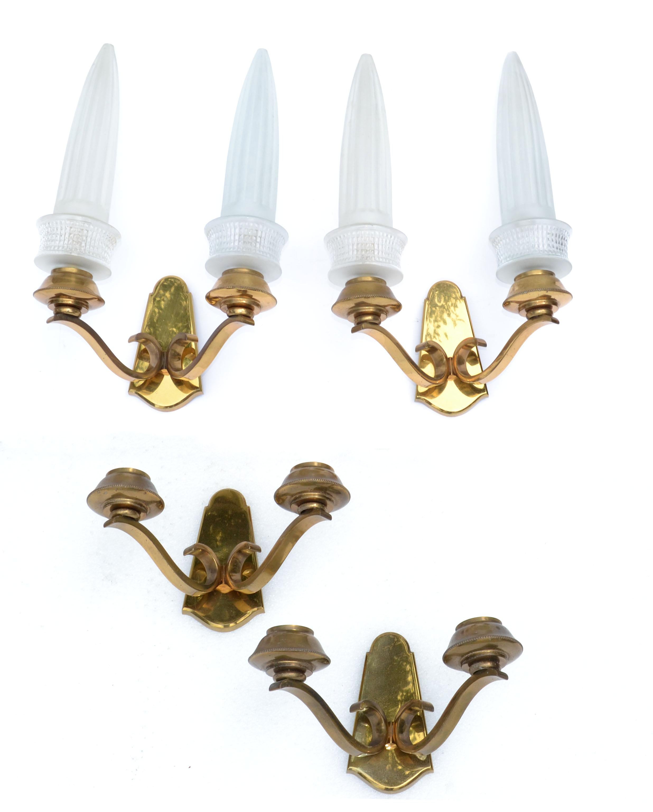 Classic and elegant Art Deco original Maison Liberos bronze sconces with the original glass shades made in Paris circa 1950s.
Stamped inside the Back Plate: Liberos Paris.
We have 4 Sconces available, priced by pair.
Working condition and each